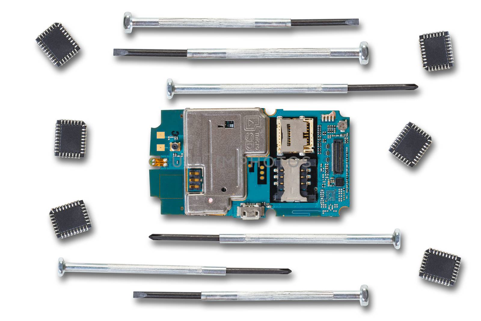 disassembled mobile phone and tools on white background