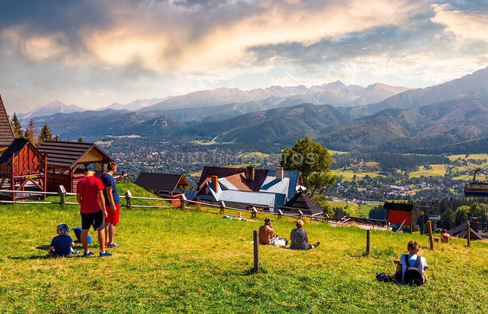 tourist observe High Tatra mountains by Pellinni