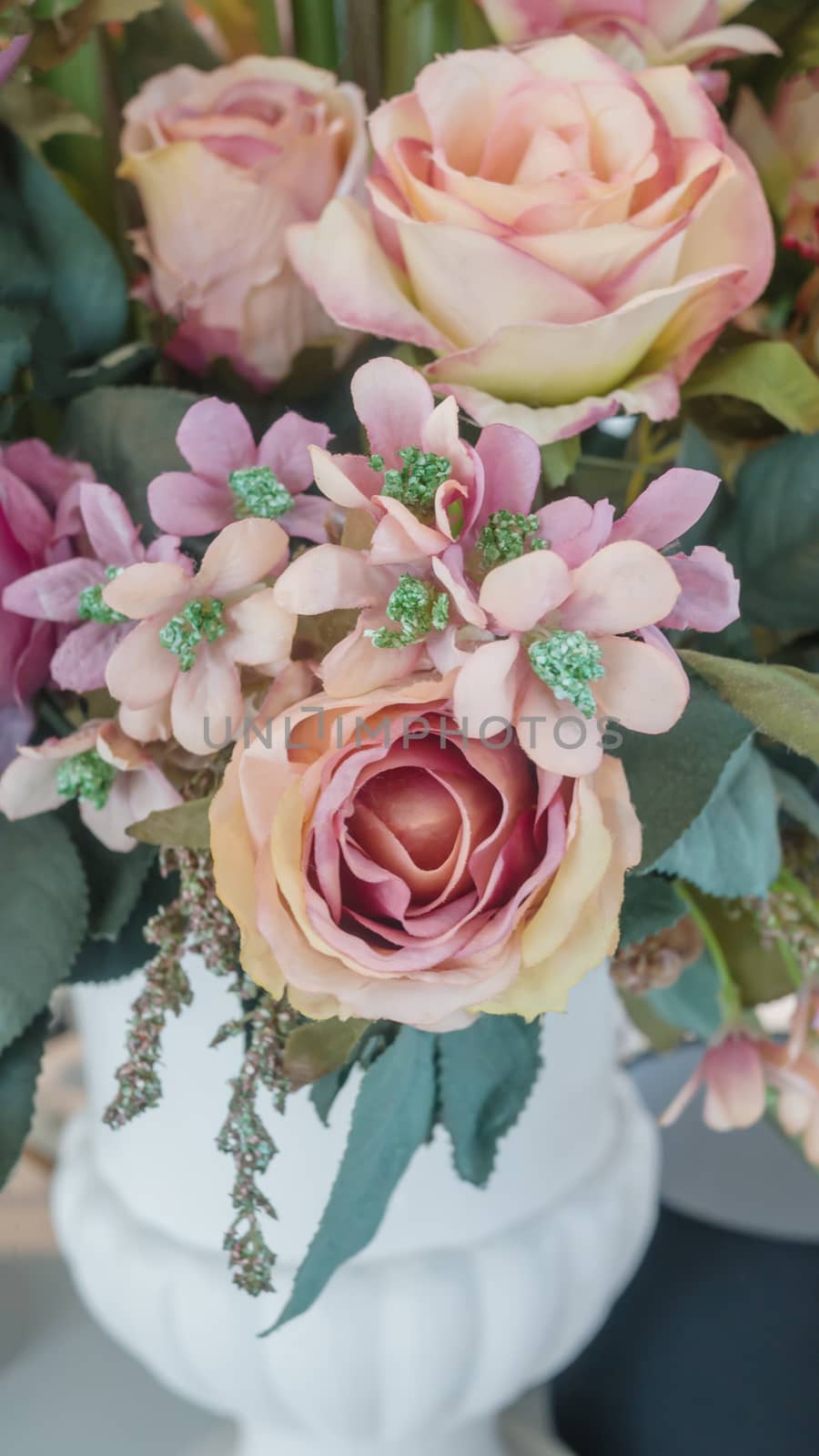 colorful of the plastic flowers bouquet , soft of focus