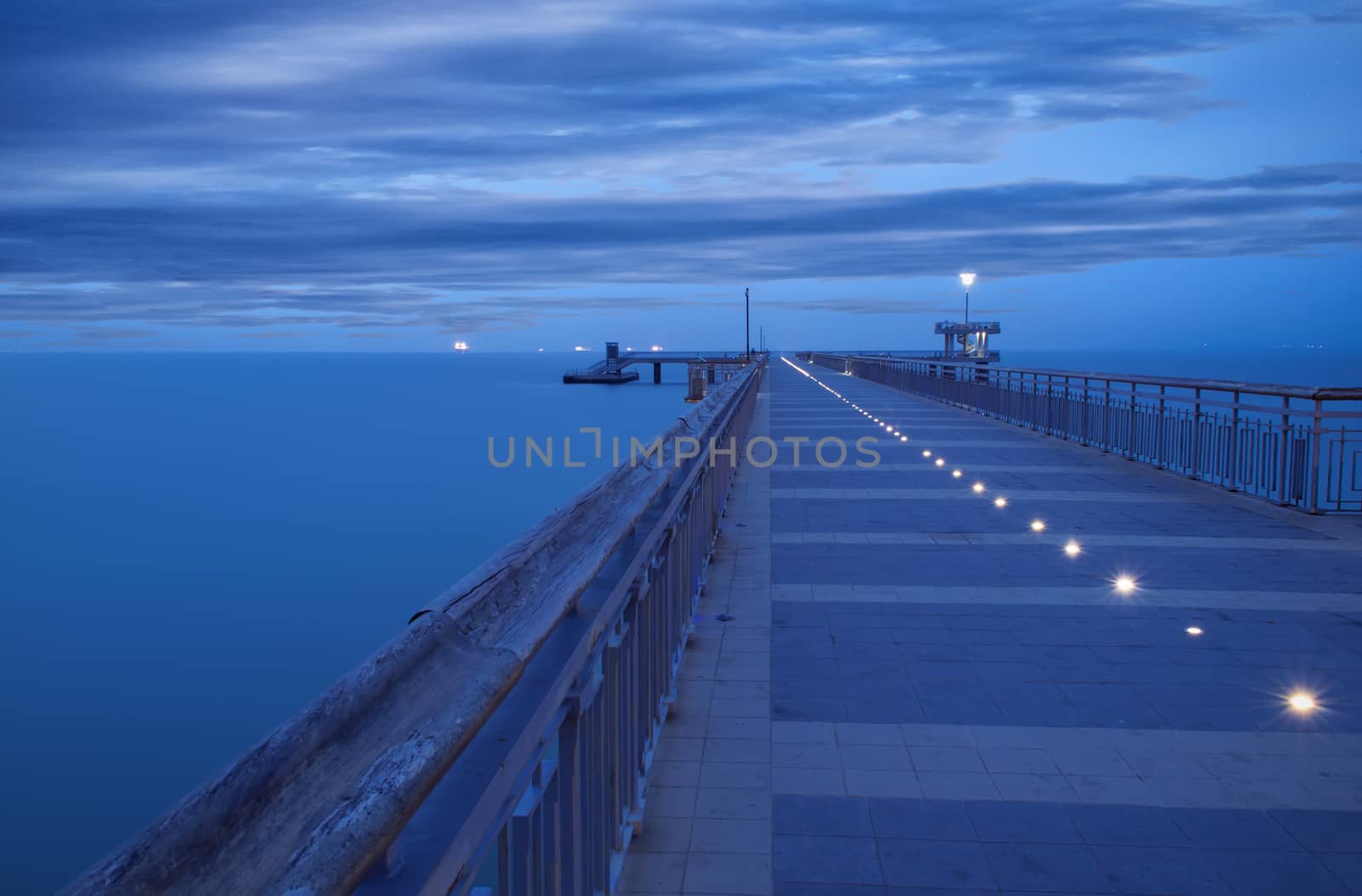 Before sunrise in Burgas bay. Bridge in Burgas, Bulgaria. Long exposure, blue hour. Kay port