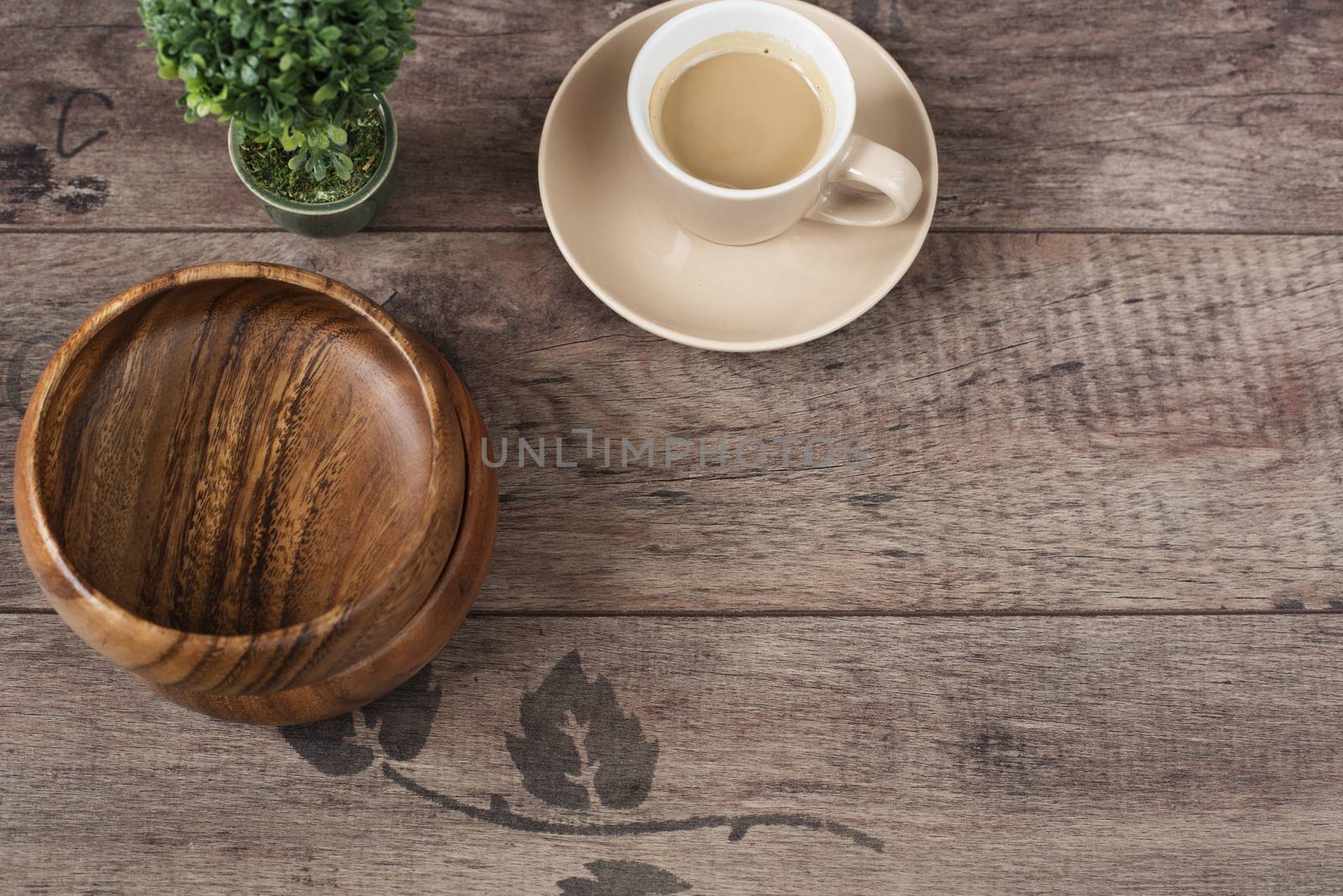 Coffee espresso, bonsai tree and bamboo bowls on a wooden table background. Dark wood. Empty place, copy space. Top view