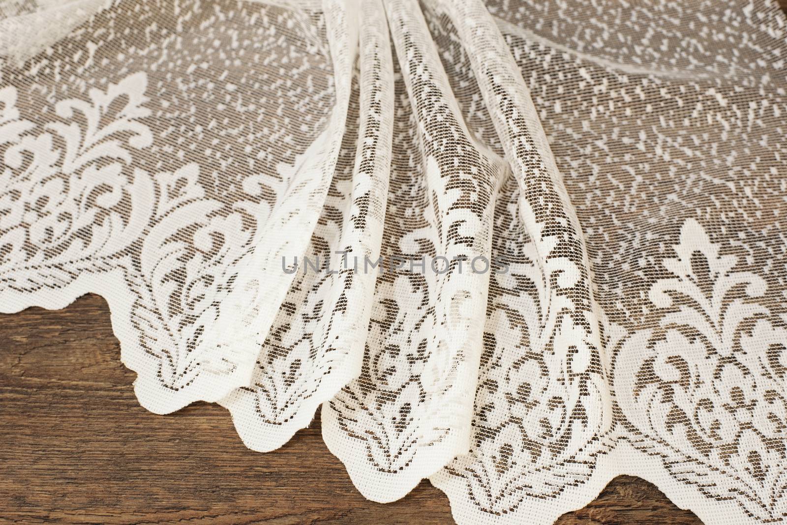 Close up of Beautiful White Tulle. Sheer Curtains Fabric Sample. Texture, Background, Pattern. Wedding Concept. Interior Design. Vintage Lace Tulle Chiffon