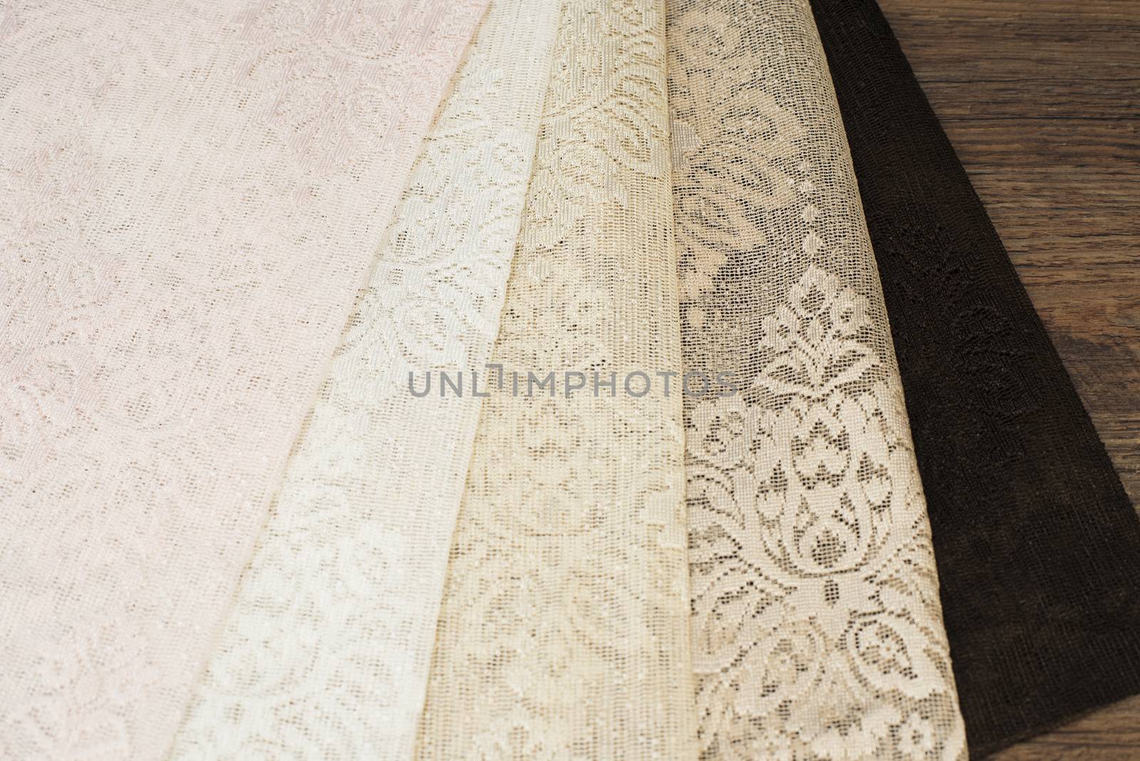 Close up of Beautiful Sheer Curtains Fabric Samples. Texture, Background, Pattern. Wedding Concept. Interior Design. Vintage Lace Tulle Chiffon ? White, Beige, Brown by sevda_stancheva