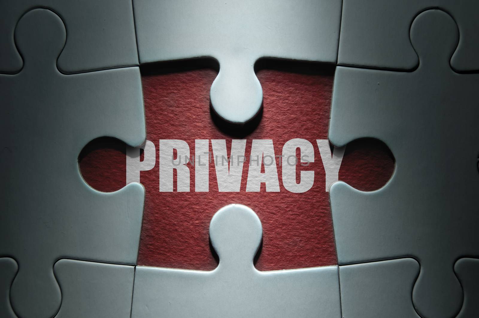 Missing piece from a jigsaw puzzle revealing the word privacy