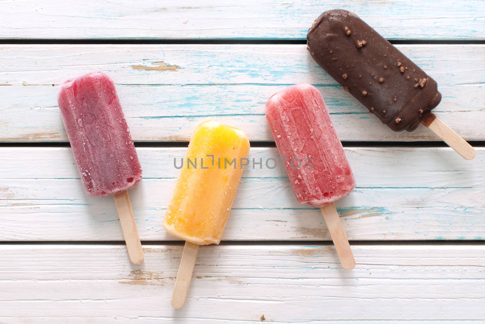 Assorted flavored ice popsicles