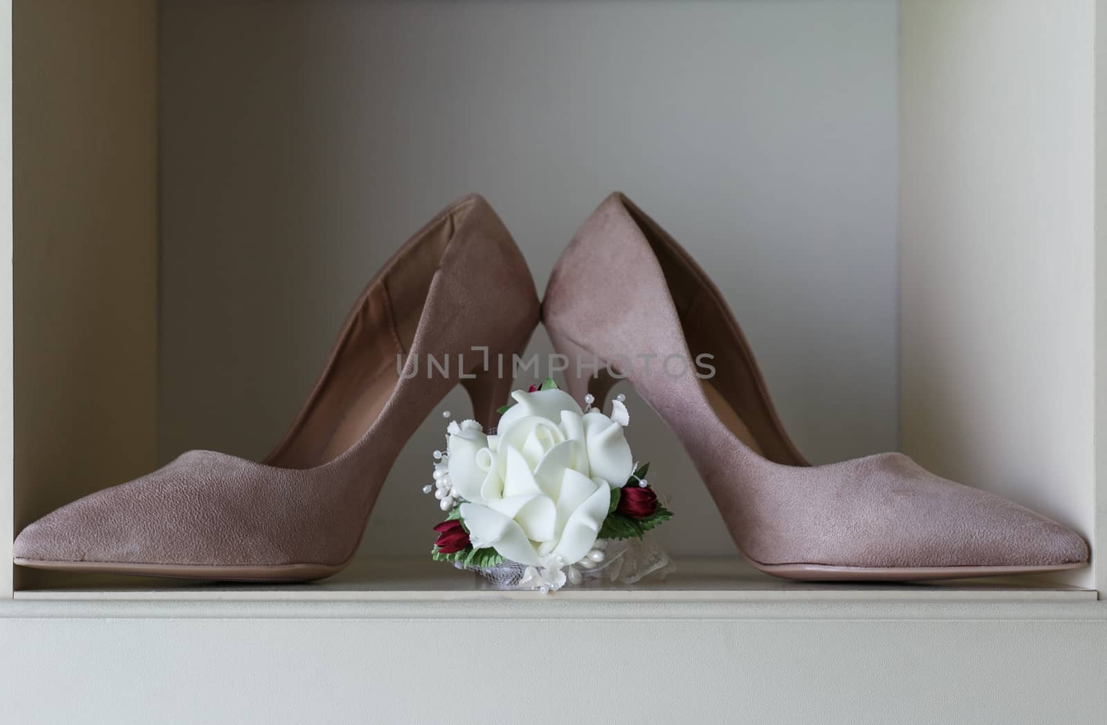 Elegant bridal shoes and accessories. Shallow depth of field.
