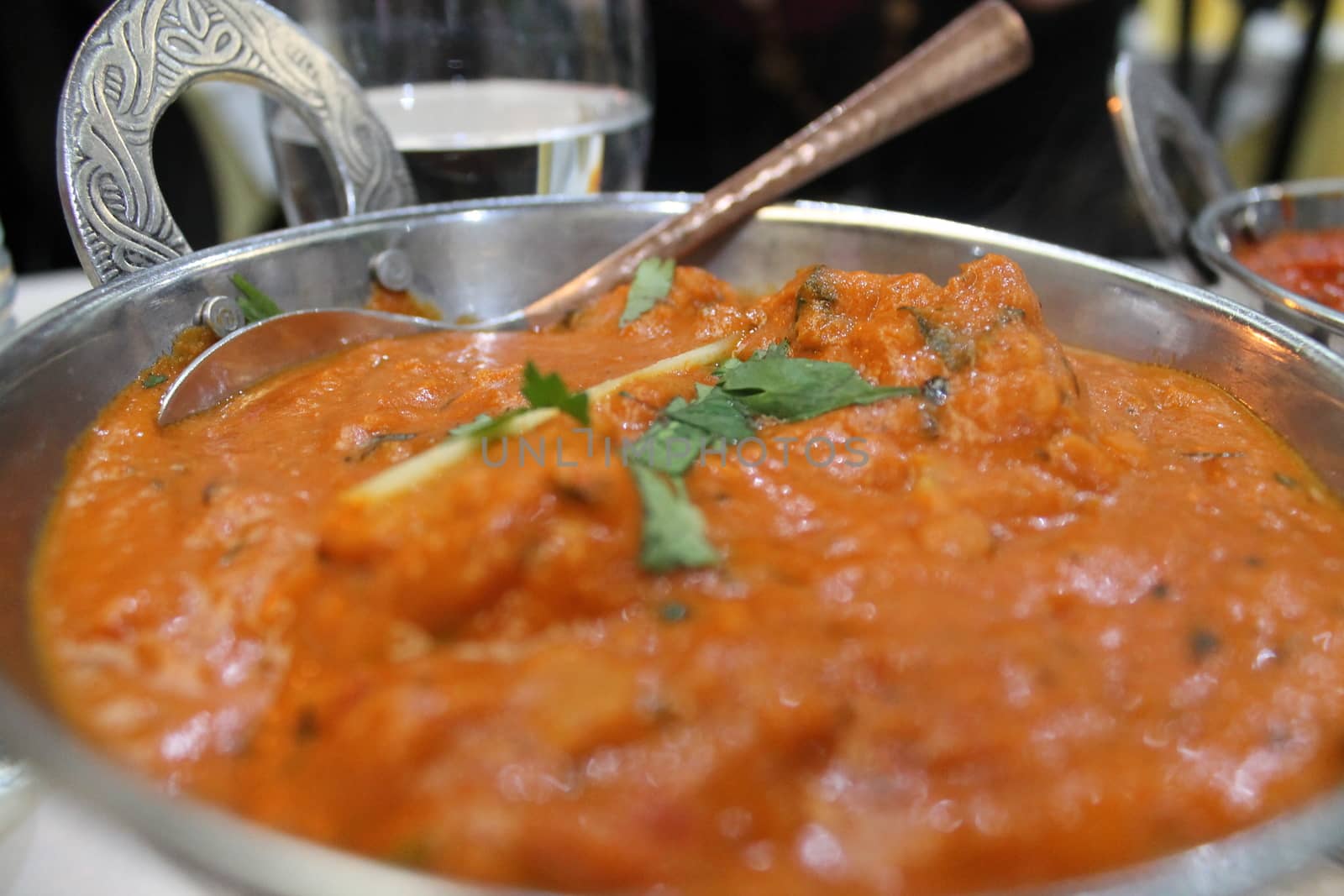 Typical Indian chicken tikka masala food by lovecomunication