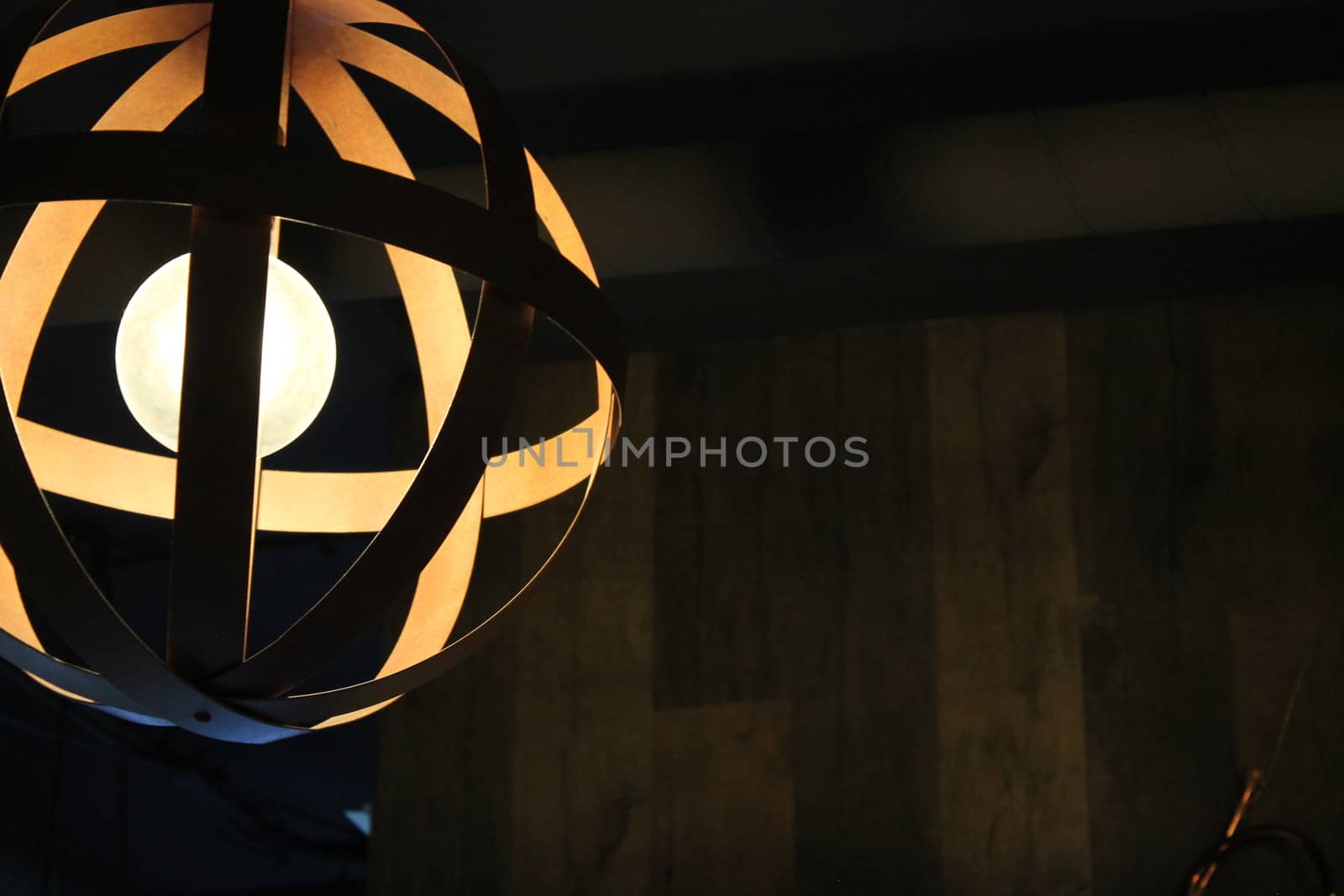 Modern lamp with details on light bulb by lovecomunication