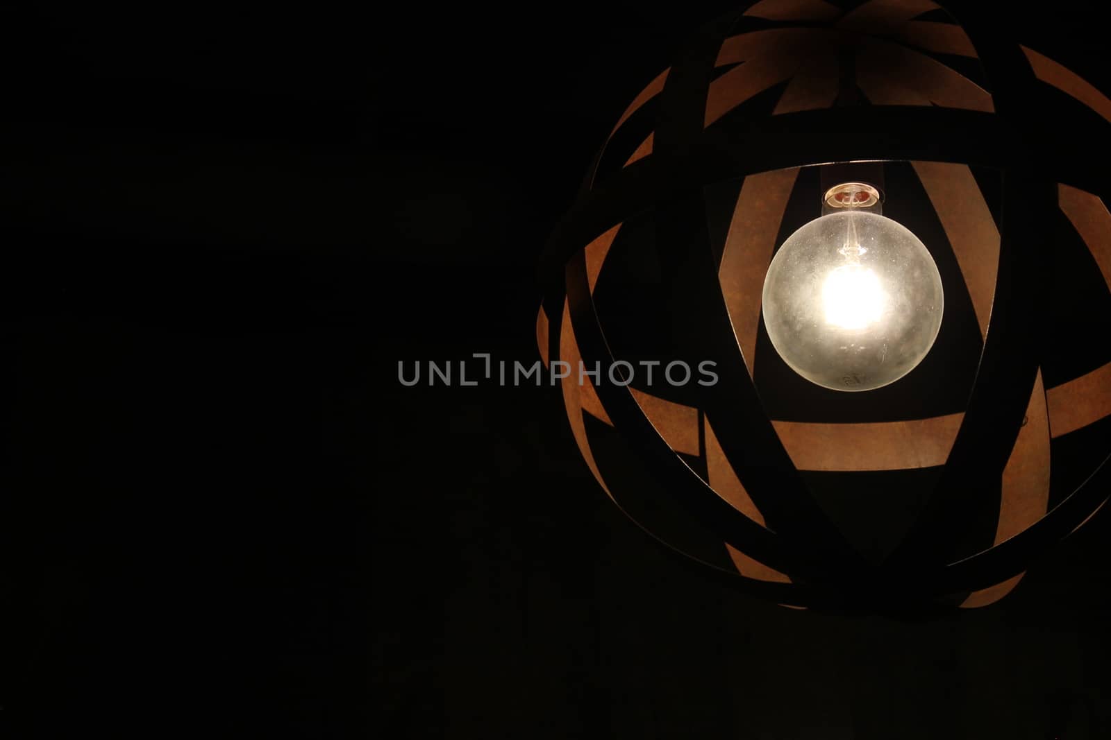 Modern lamp with details on light bulb by lovecomunication