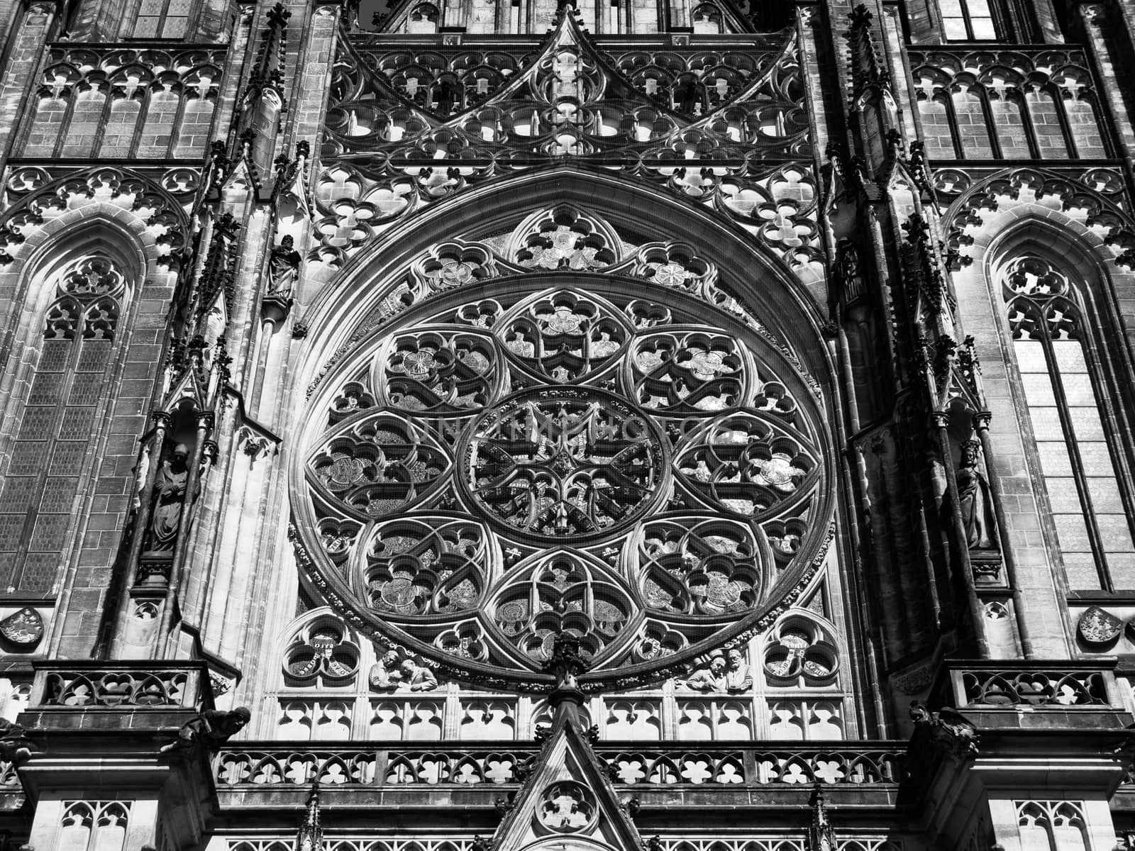 Detailed view on gothic rose window of St. Vitus Cathedral in Prague, Czech Republic. Black and white image.