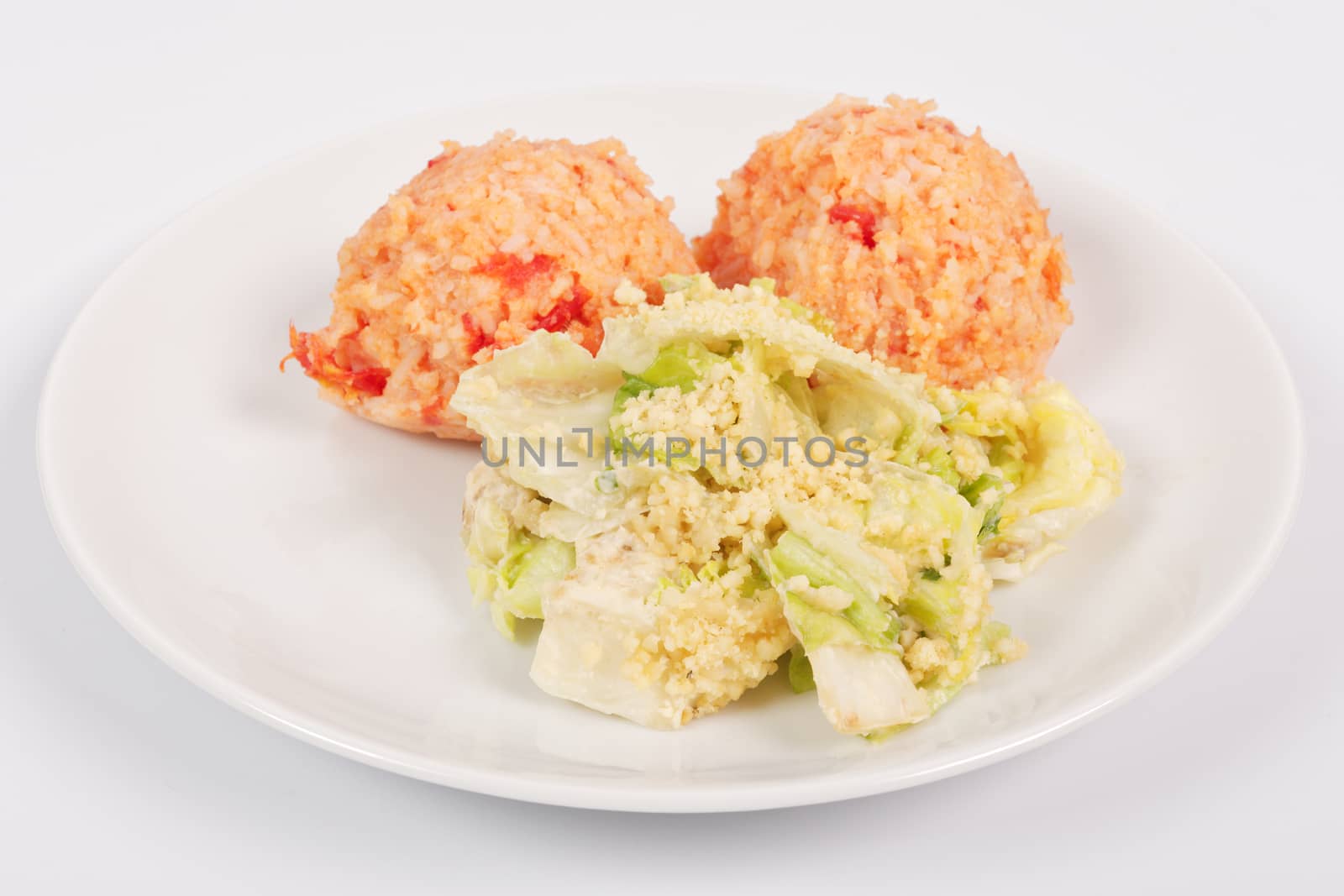 Tomato rice and salad on a white background