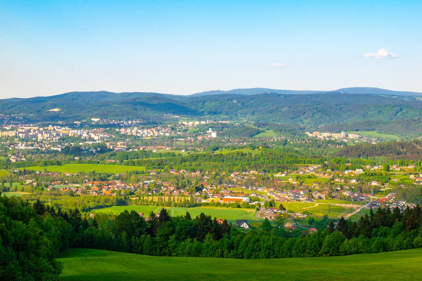 Liberec City Panorama with Jizera Mountains on the background, Czech Republic. Sunny spring day.