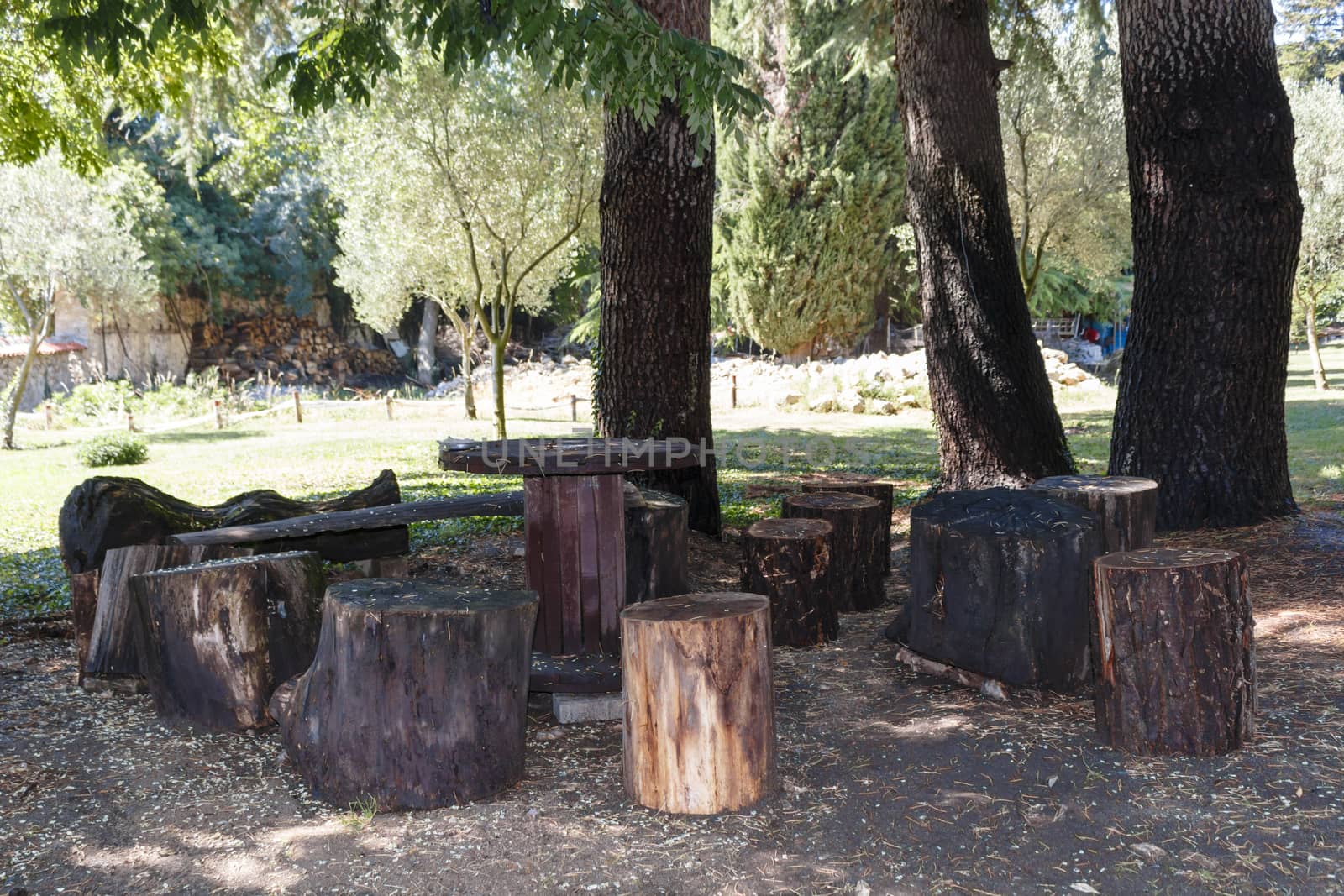 Serbian old traditional home garden with improvised table and chairs