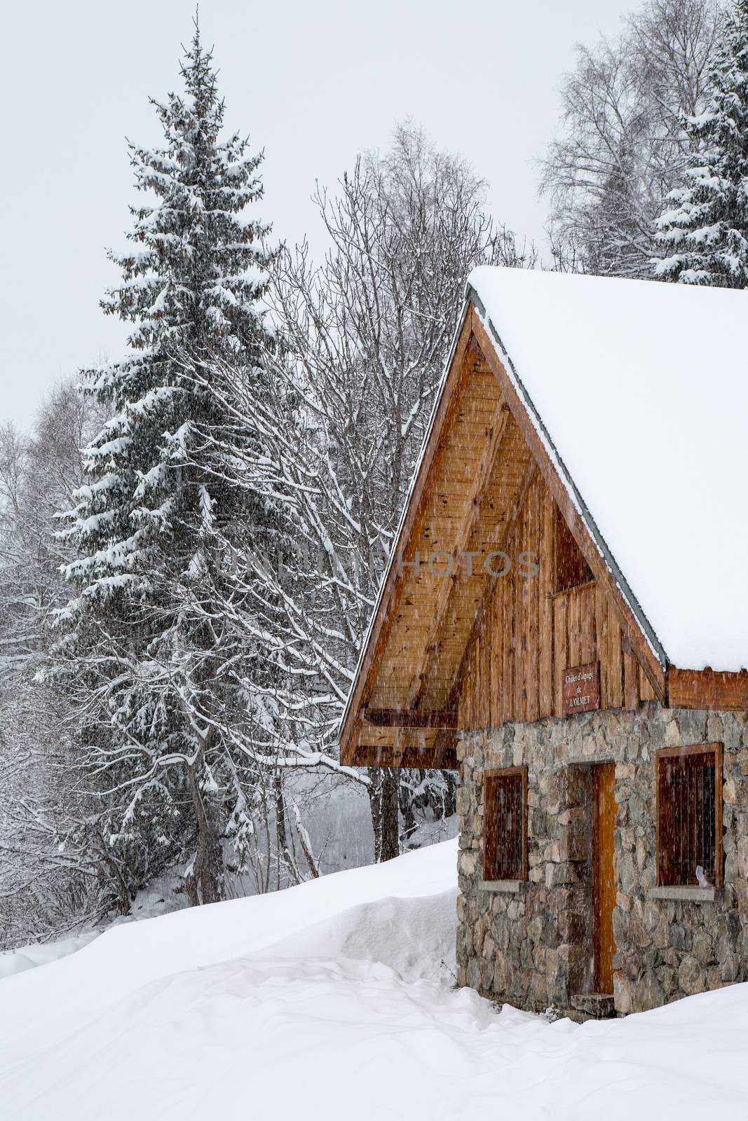 Chalet covered with snow in the French Alps