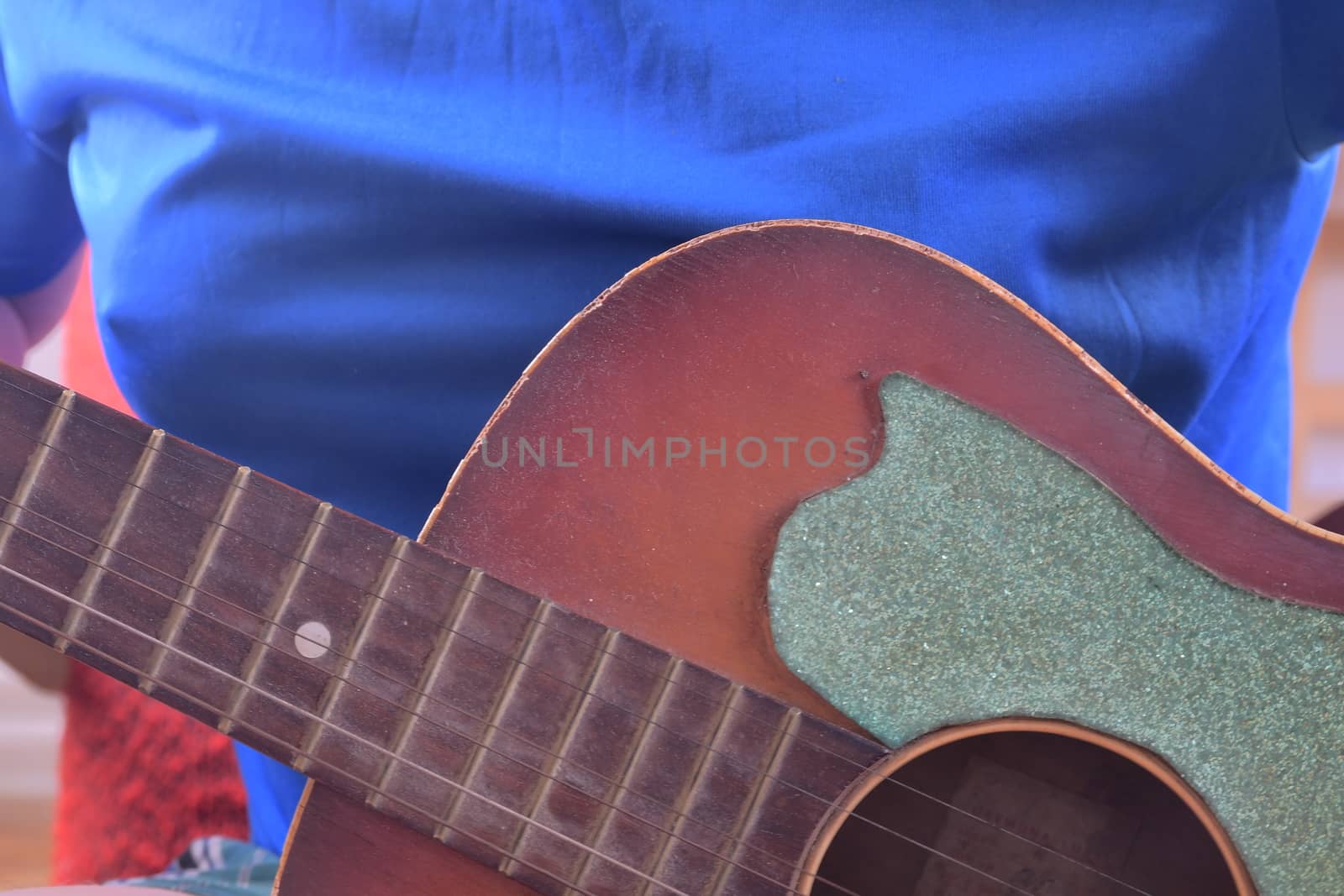 Man playing acoustic guitar. Musical concept. Close-up. by roman_nerud