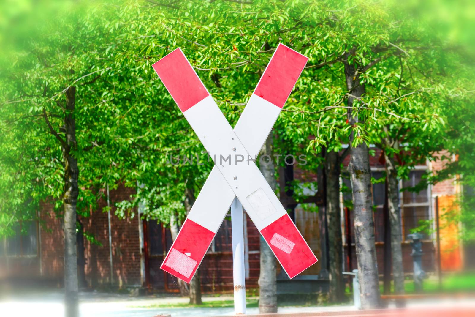 Railroad crossing with a saltire (St. Andrew's Cross)