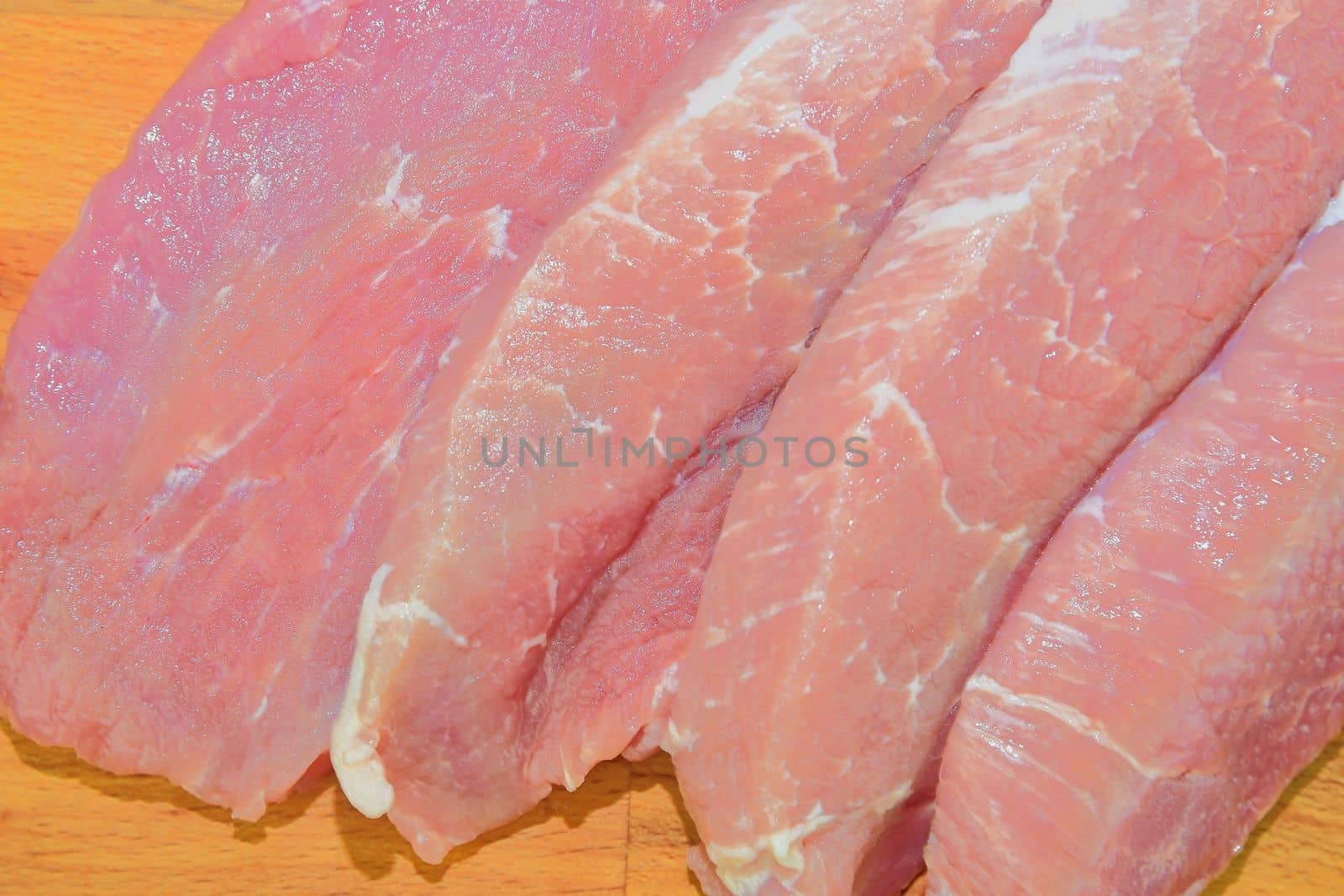 Slices of pork steaks. Pork chops ready to fry. 