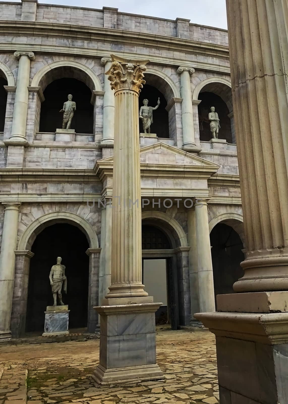 roman or greec statues on an old vintage ancient building