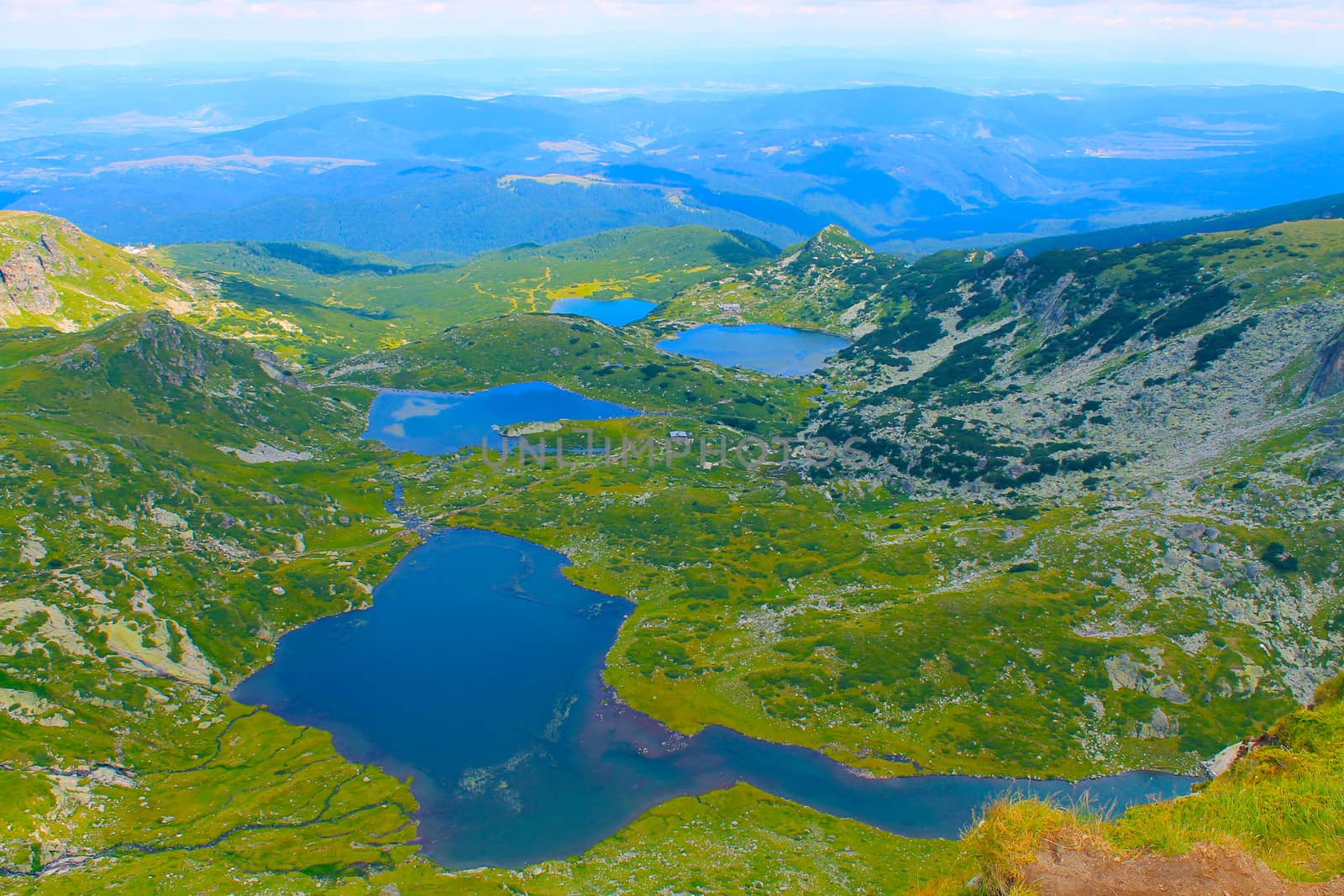 Panorama of mountain lakes in the spring