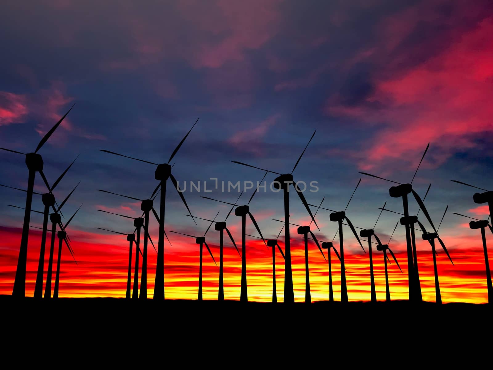 Black Wind Turbines Field on a sunset background at evening time