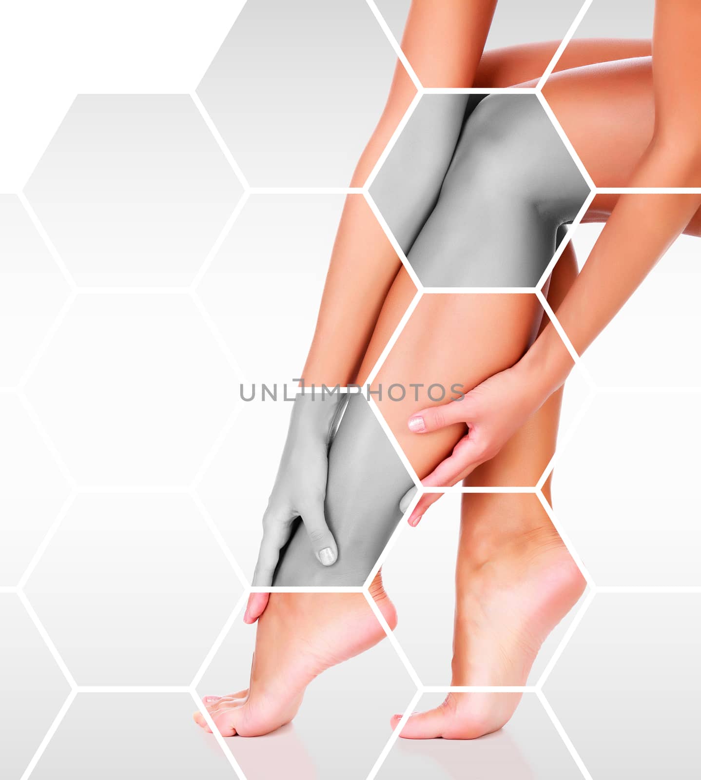 Closeup shot of beautiful female legs and hands. Unwanted hair removal and skincare concept. Perfect smooth skin