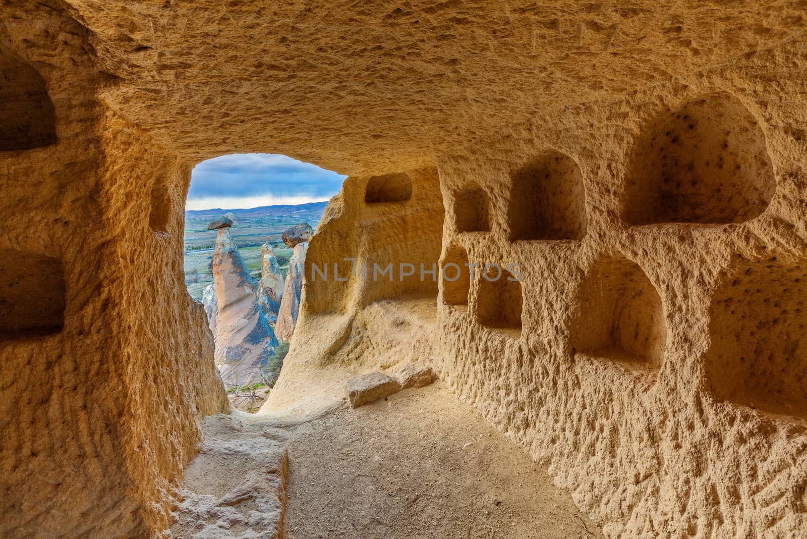 Cave house in stone cliffs in Cavusin near Goreme, Cappadocia, Turkey