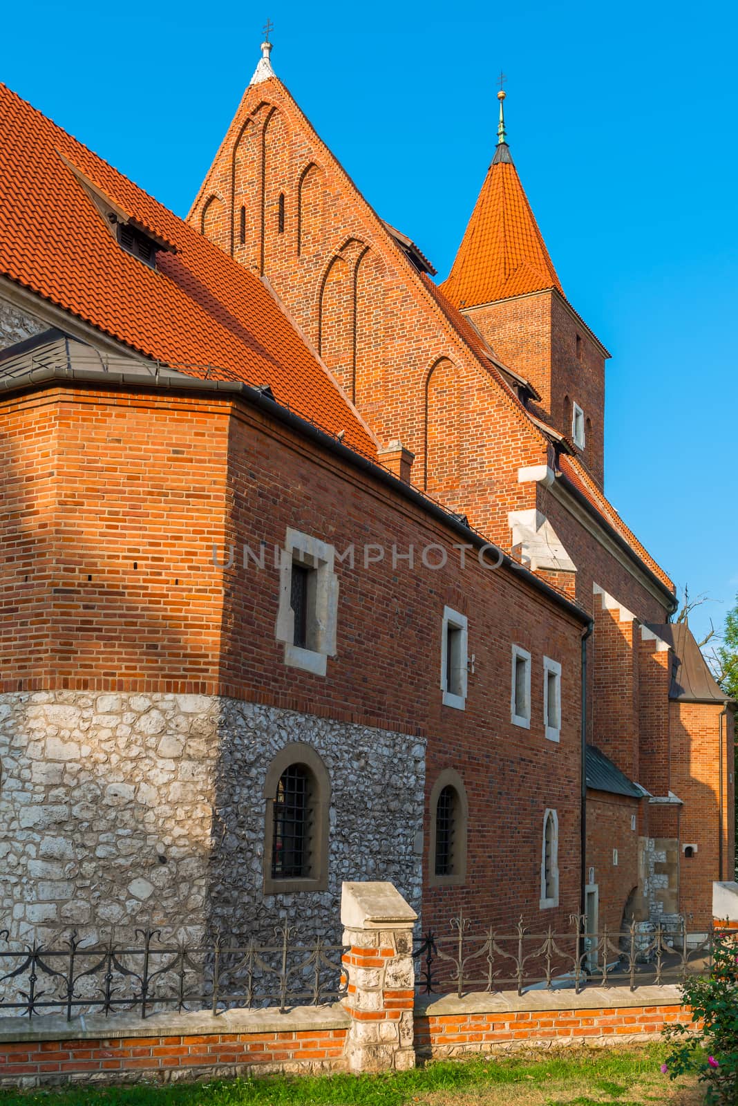 Catholic temple of red brick urban landscape, Krakow, Poland
