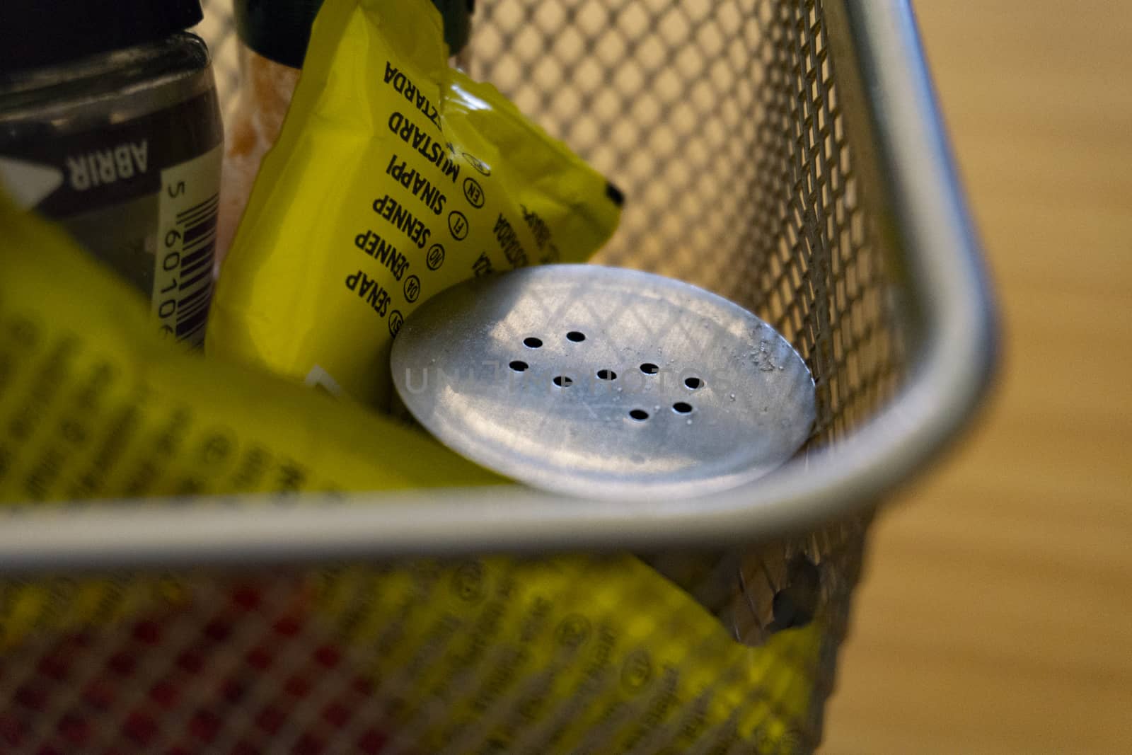 Metal salt cellar in fast food mayonnaise