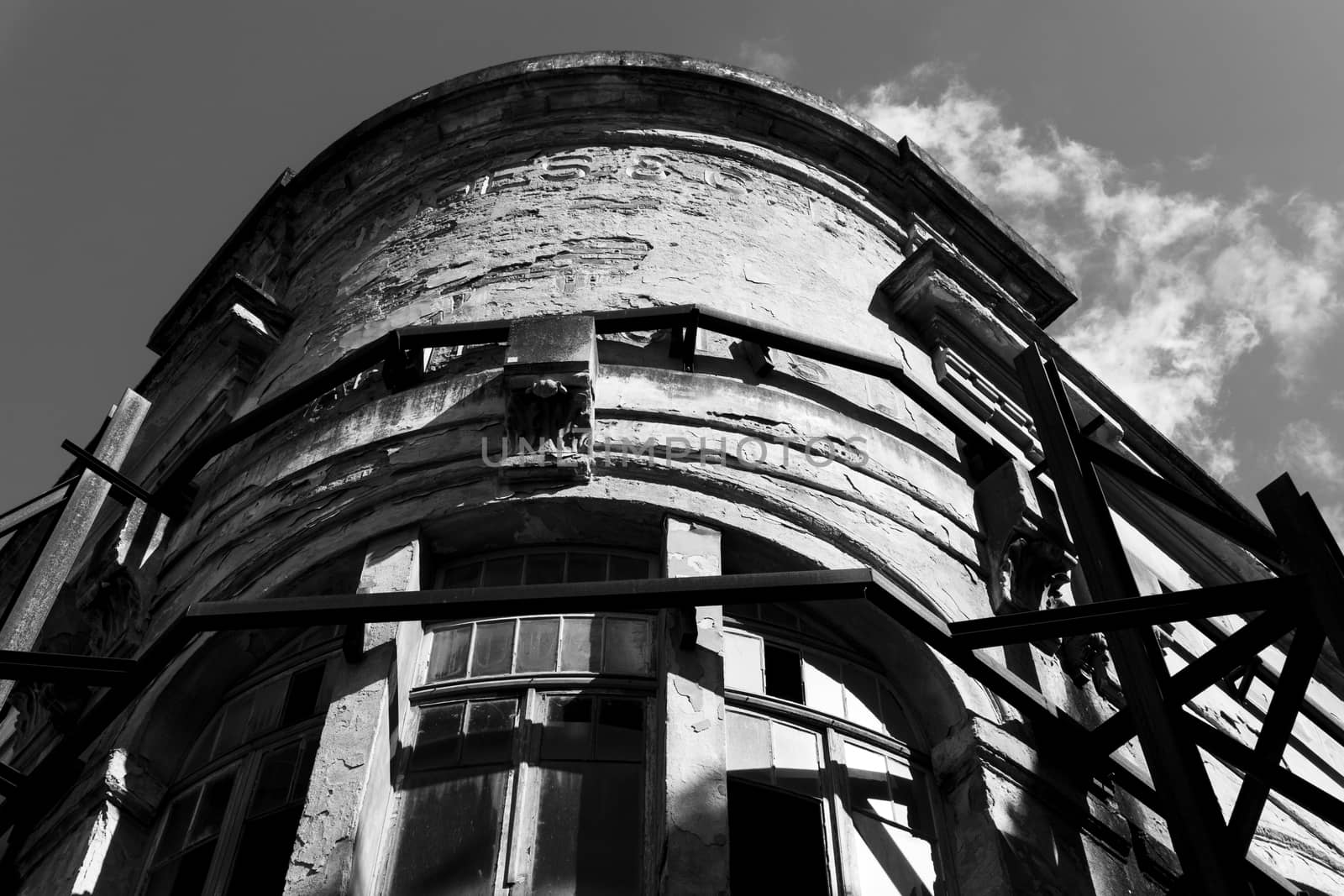 ancient ruined building with iron scaffolding Ancient textile factory in Lisbon