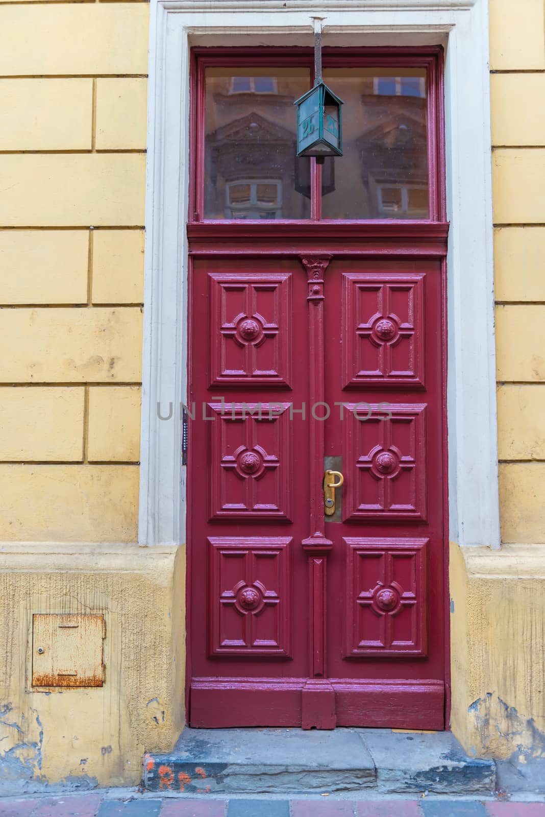 residential building view of the cherry-colored door close-up