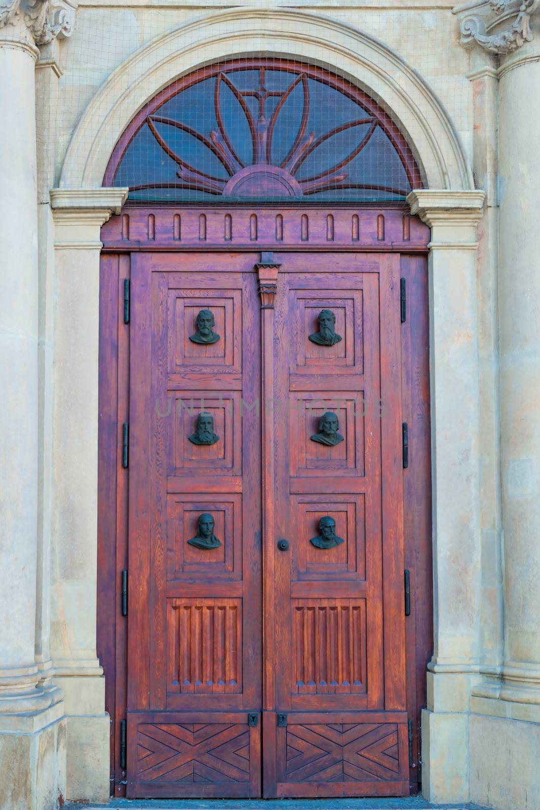 vertical photo of a close-up of a building door