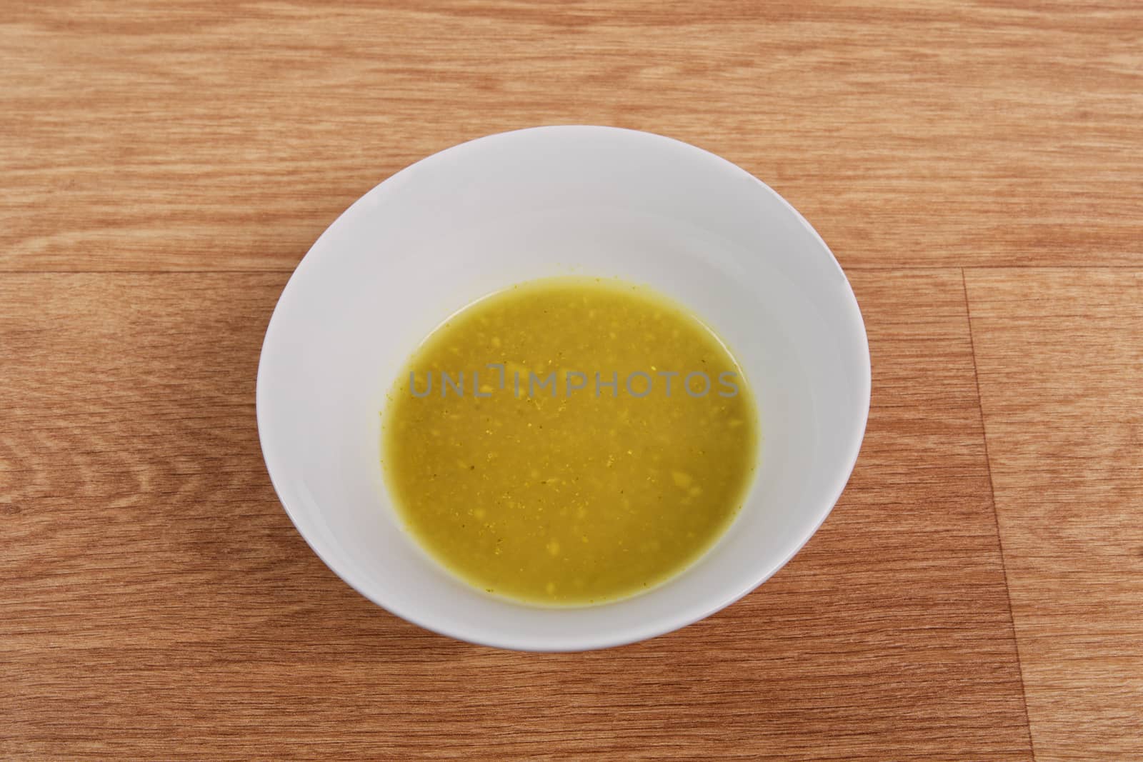 Creamy broccoli soup on a wooden table