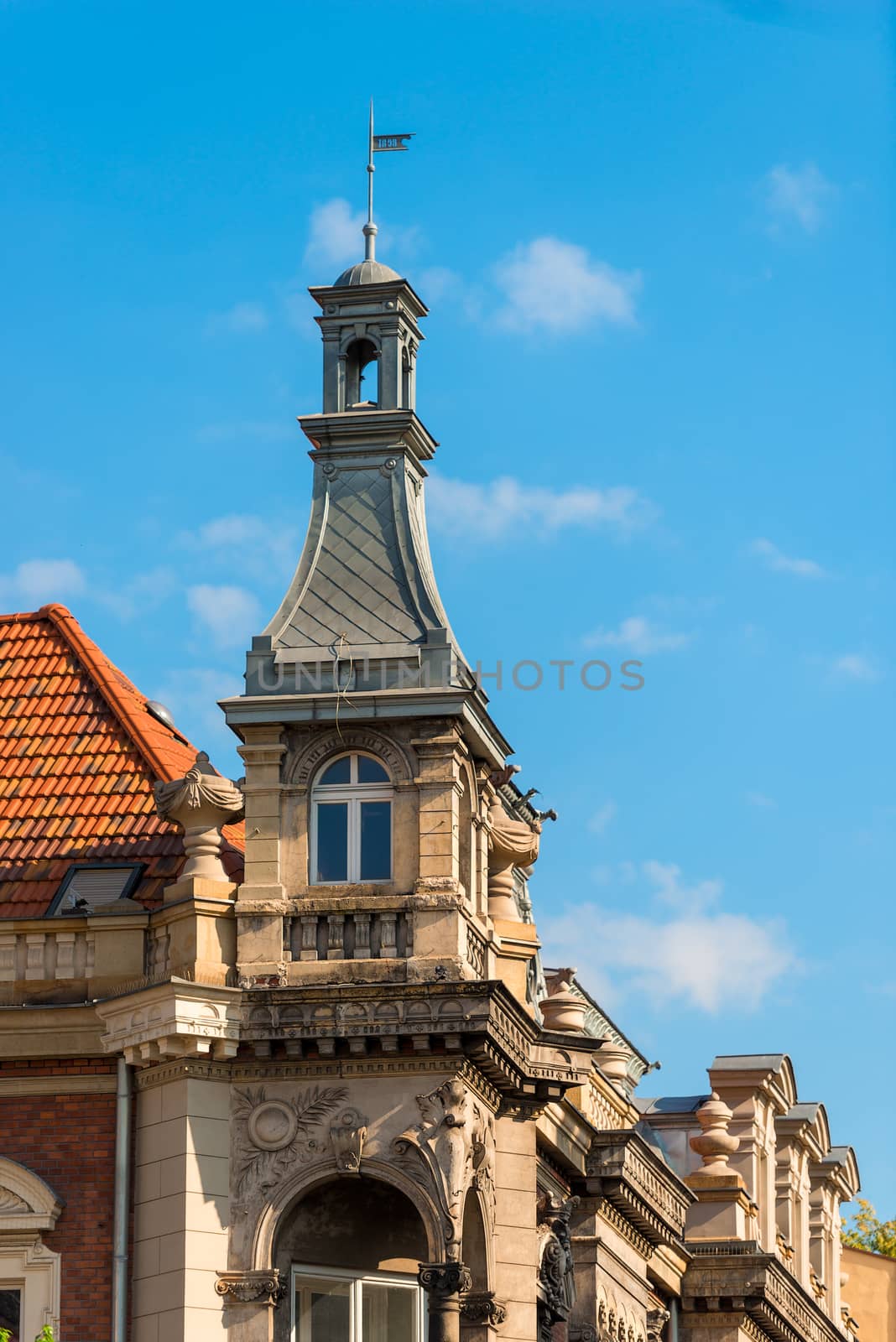 details of the architecture of a European city against a blue sk by kosmsos111