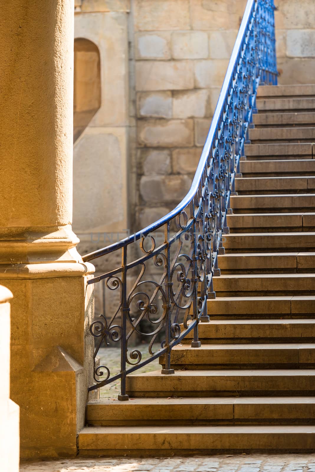 detail of the architecture of the city - a ladder with metal forged rails