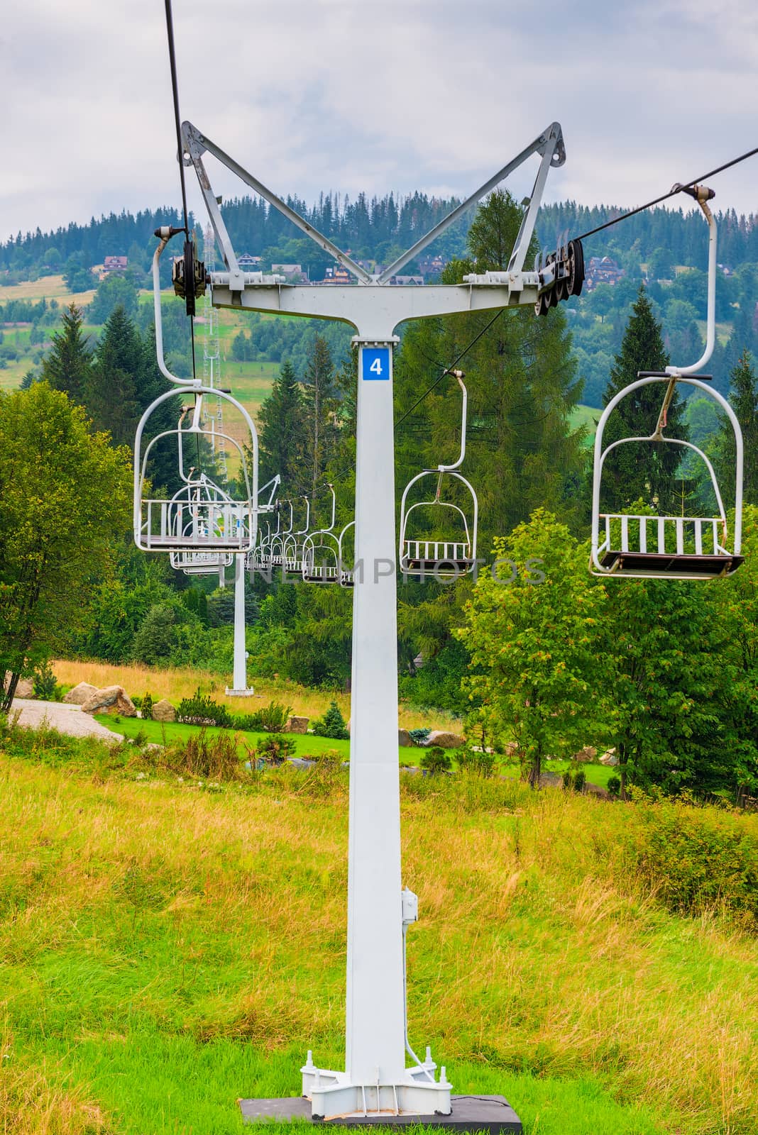 support of the seat lift vertical image in the mountains