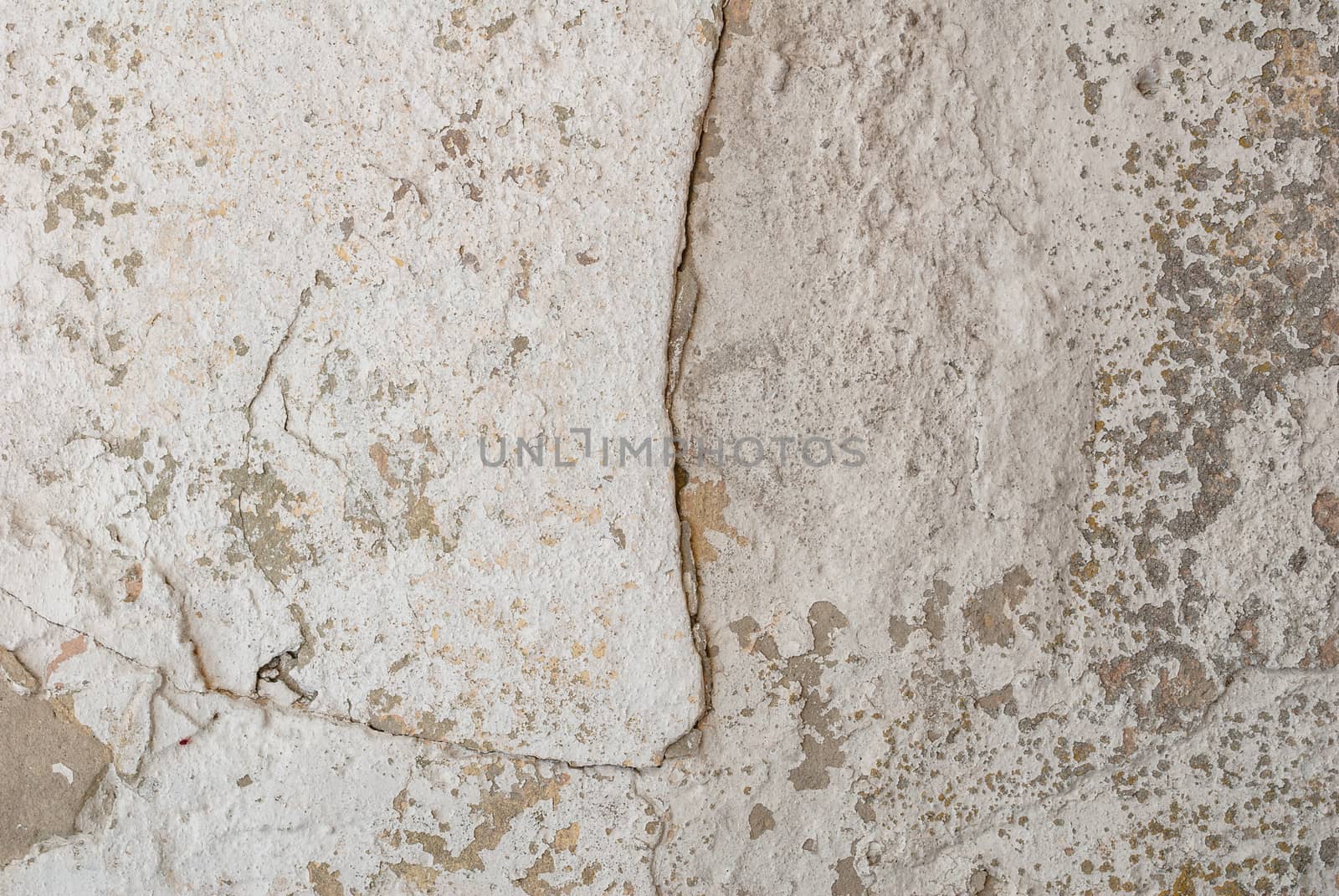 old chipped plaster on the concrete wall, cracks in old concrete wall, grey texture, background by uvisni