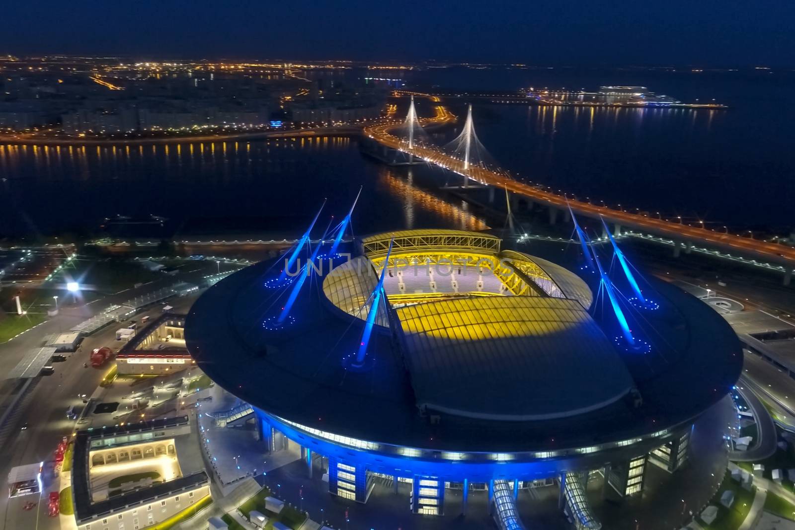 Stadium Zenith Arena at night. Illuminated by multi-colored lights the stadium at night