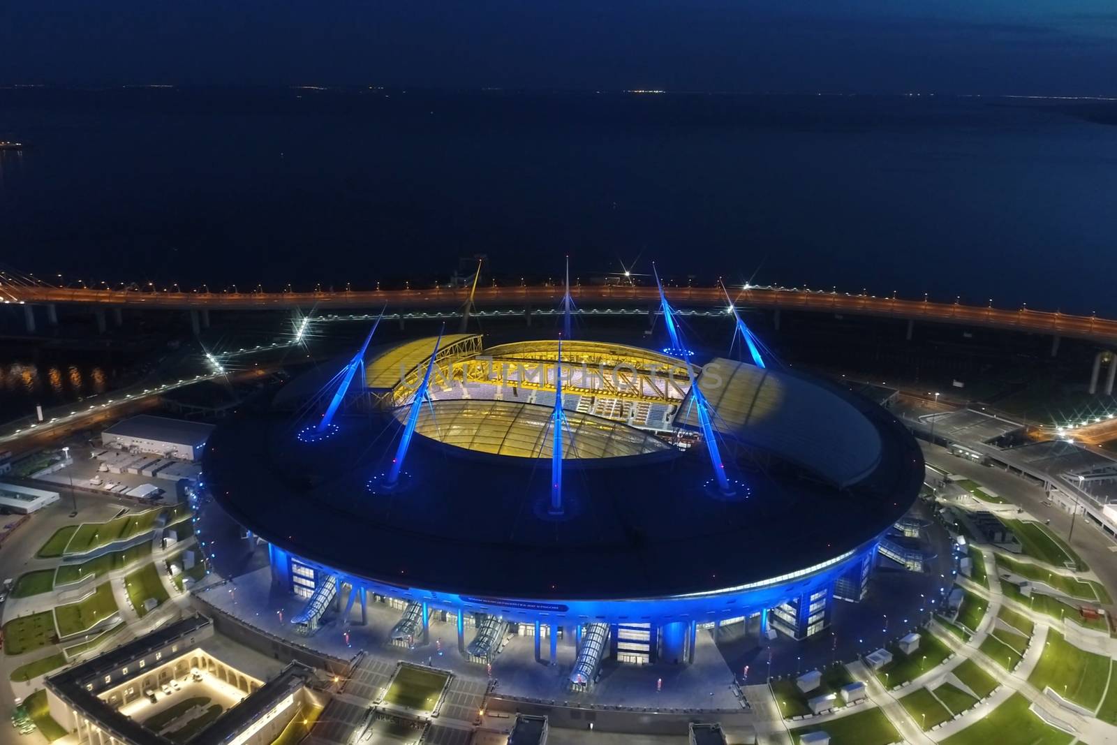 Stadium Zenith Arena at night. Illuminated by multi-colored lights the stadium at night