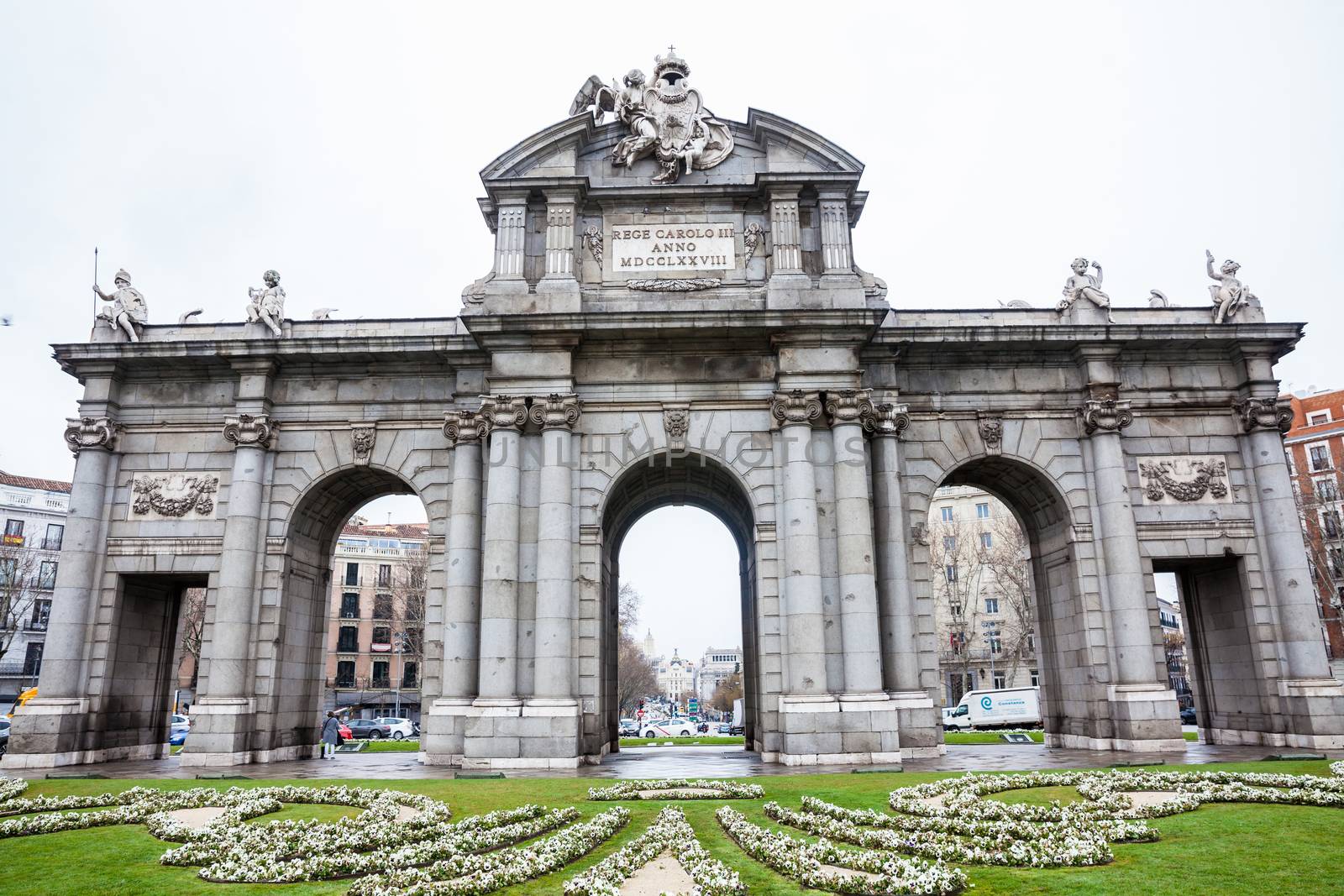 Alcala Gate on a rainy winter day by anamejia18