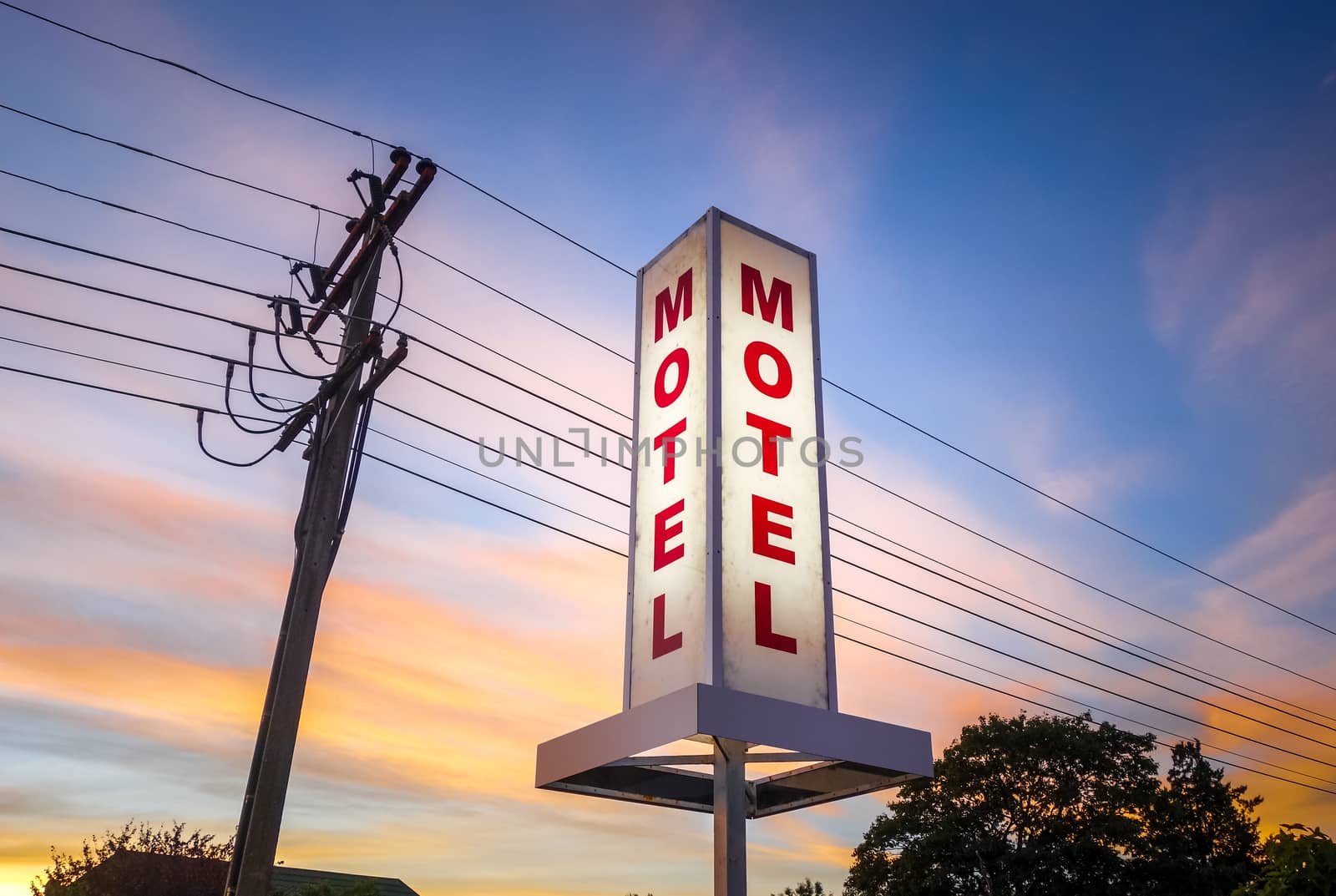 Vintage motel sign at sunset  by daboost