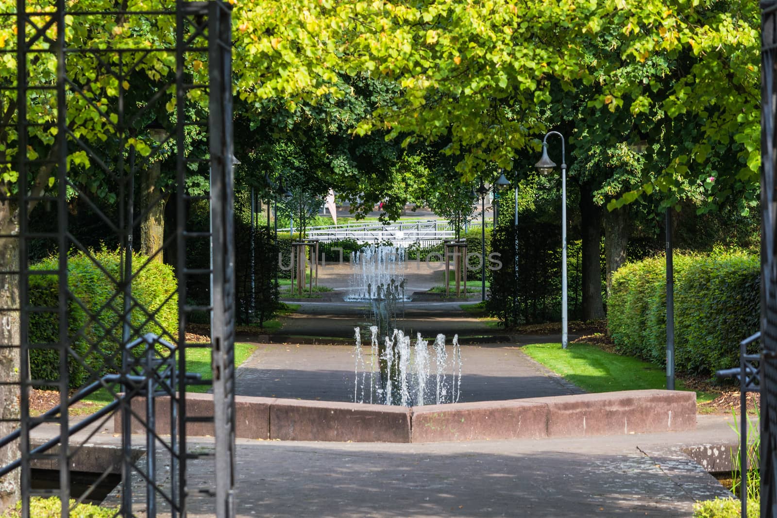 Small weir waterfall fountain in a public park