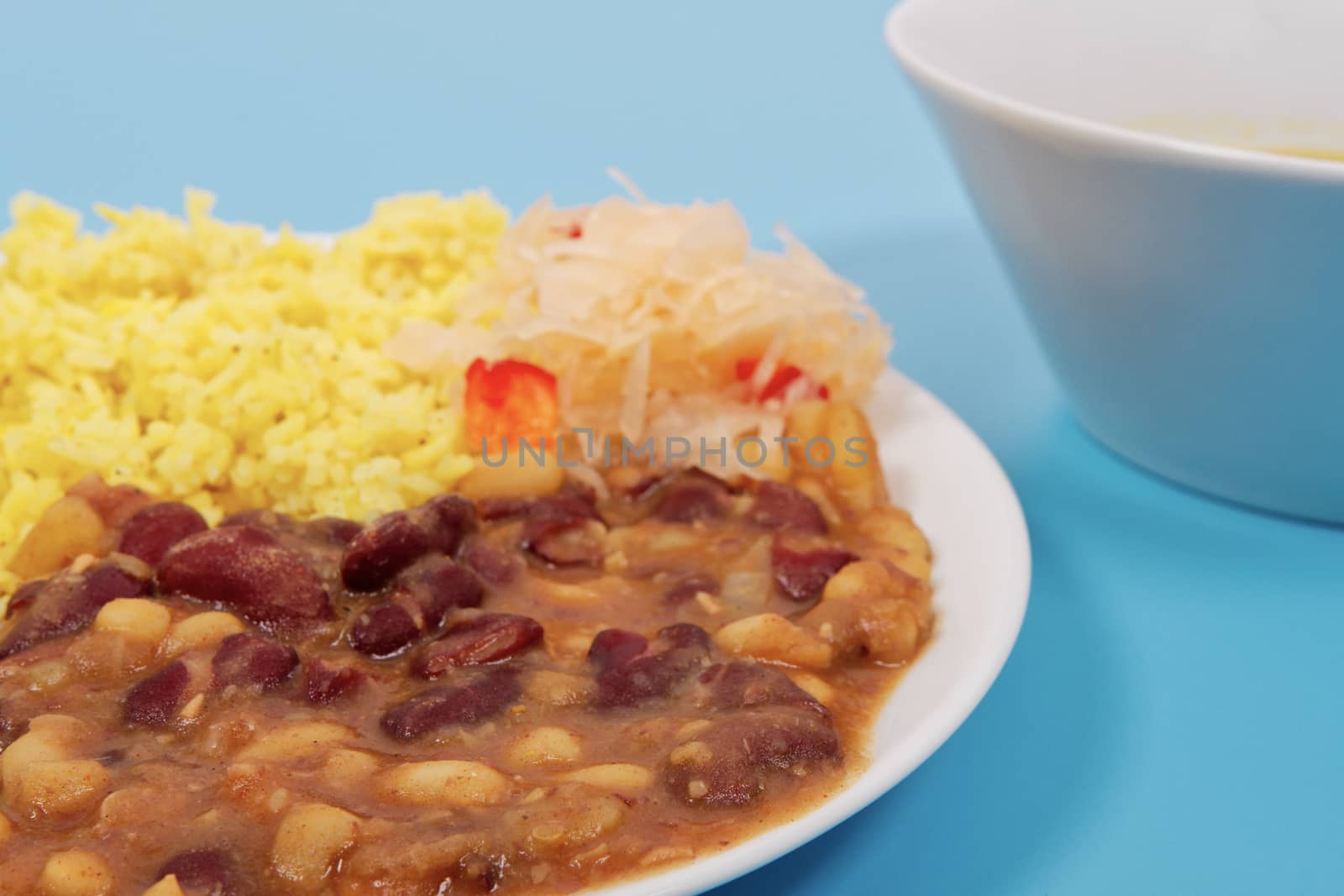 Red beans with curry rice on a blue background