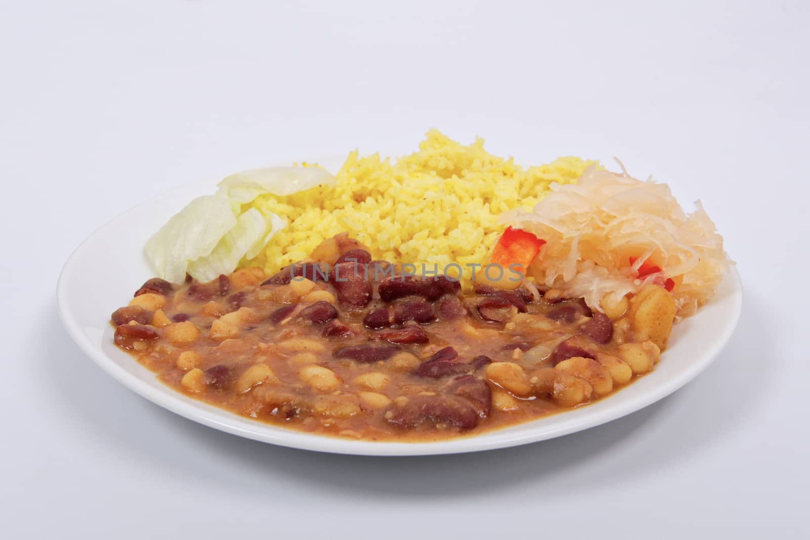 Red beans with curry rice on a white by neryx