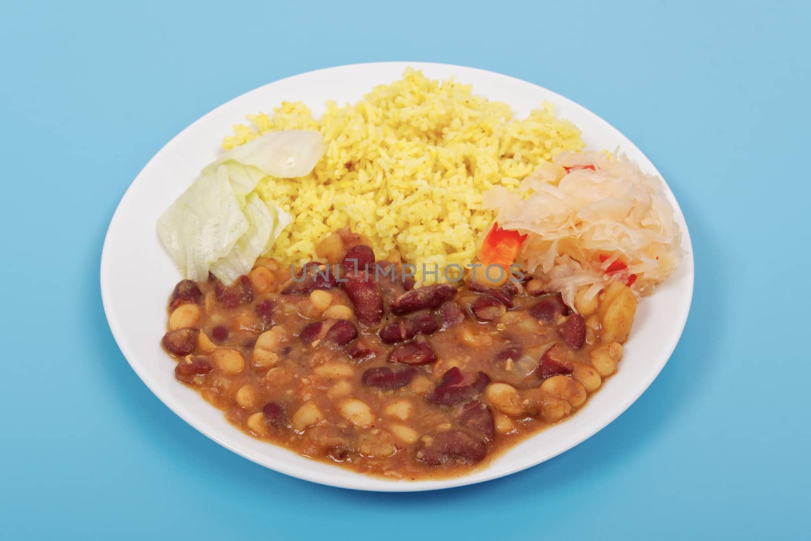 Red beans with curry rice on a blue background