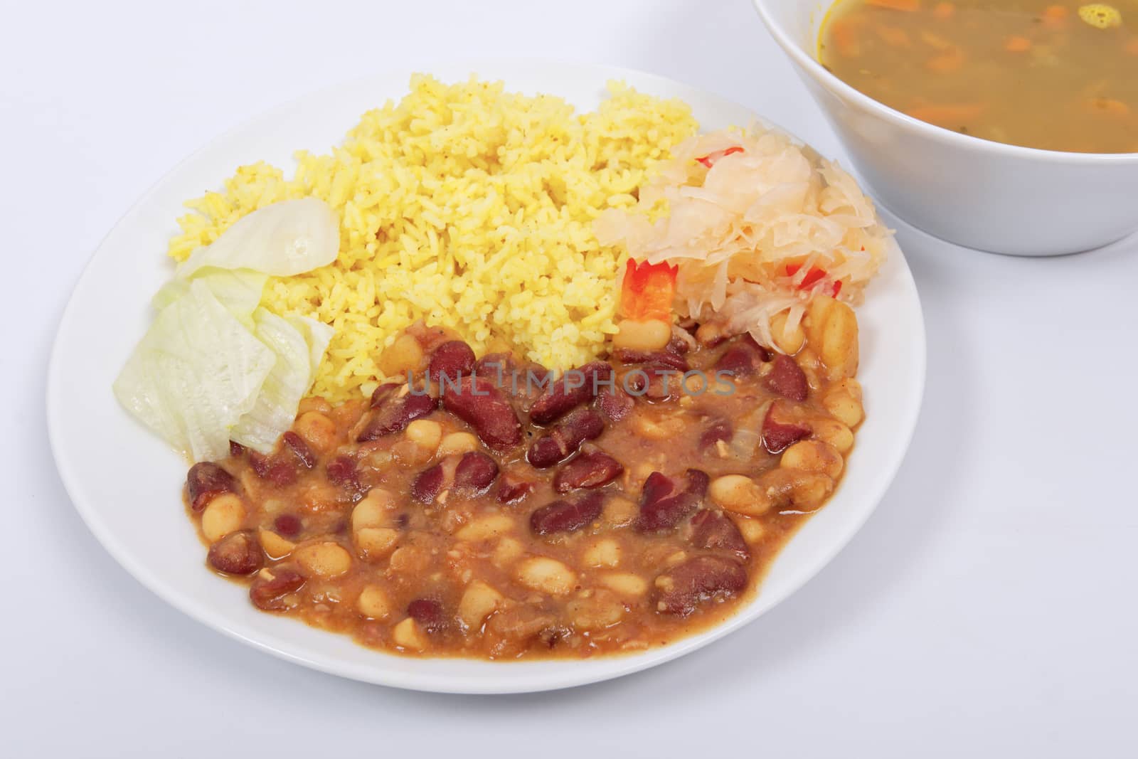 Red beans with curry rice on a white background