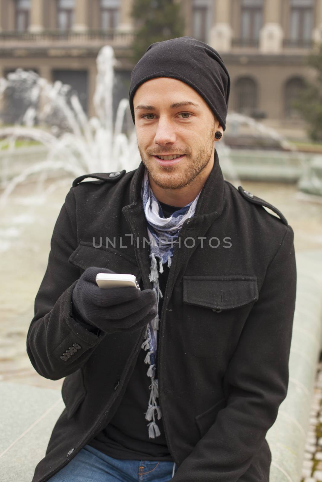 Traveling Man With Mobile Phone And Hat In City, Urban Space