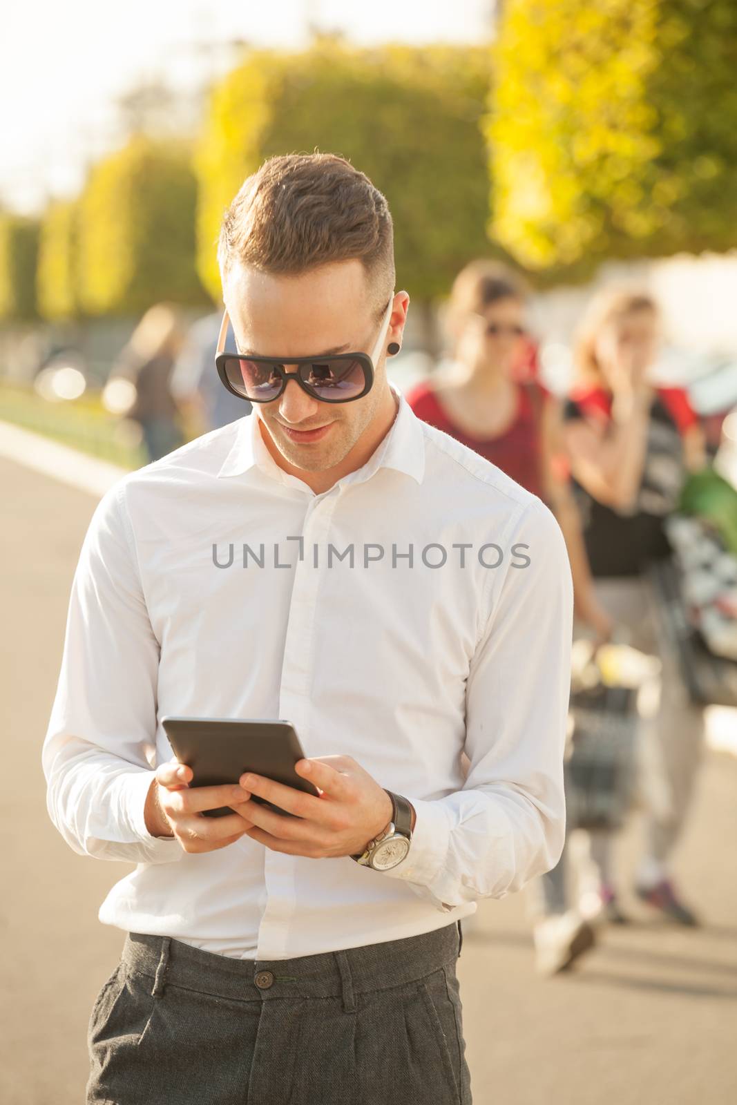 Traveling Man With Mobile Phone And Hat, In City, Urban Space