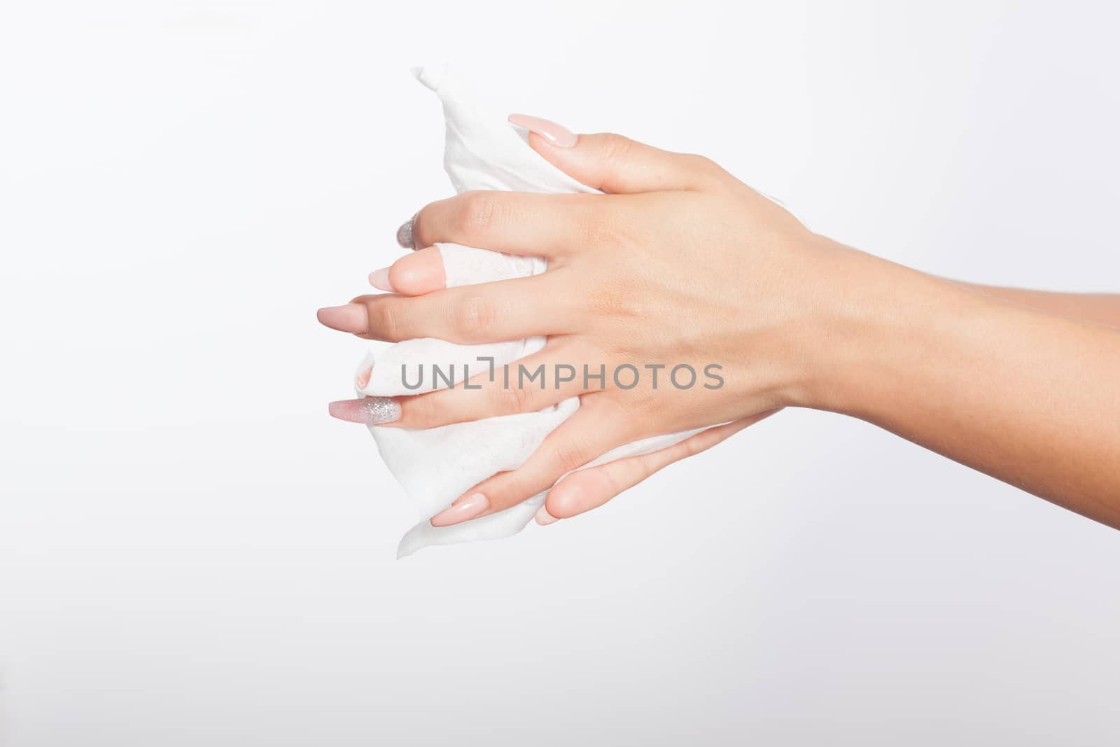 Woman use wet wipes for cleaning hands
