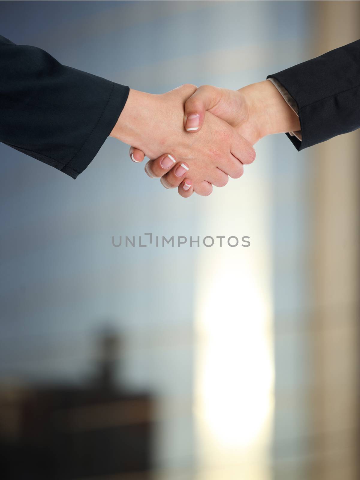 Architectural Handshaking in front of building by adamr