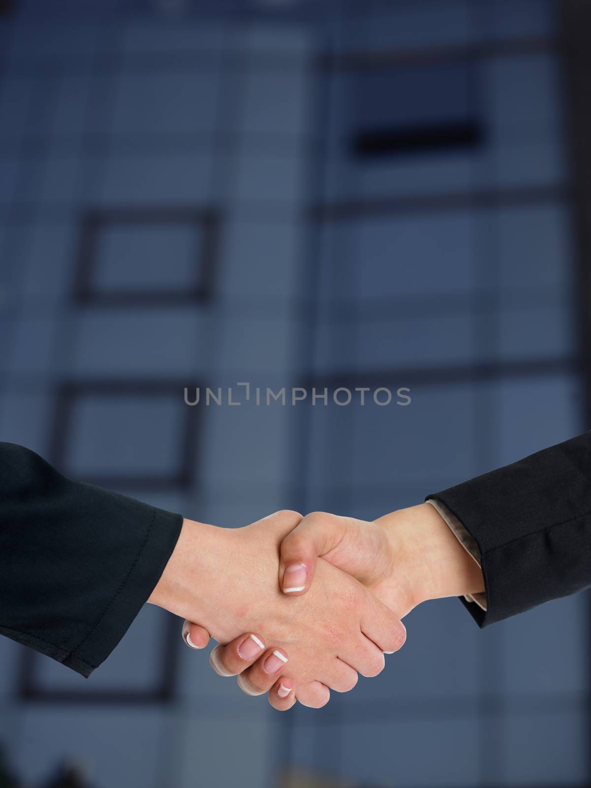 Architectural Handshaking in front of building by adamr